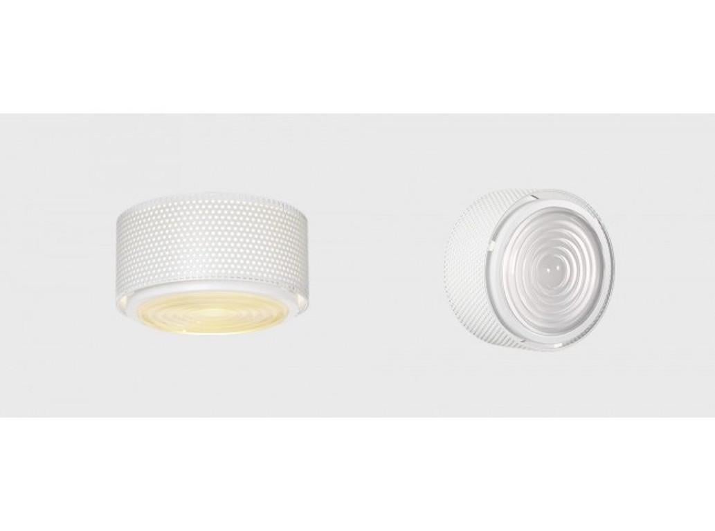 Small Model G13 flush mount wall/ceiling light by Pierre Guariche. Originally designed in 1952, this current edition is made in France by Sammode Studio. White perforated metal base, authentic Fresnel glass lens. Wired for U.S. standards The G13 is