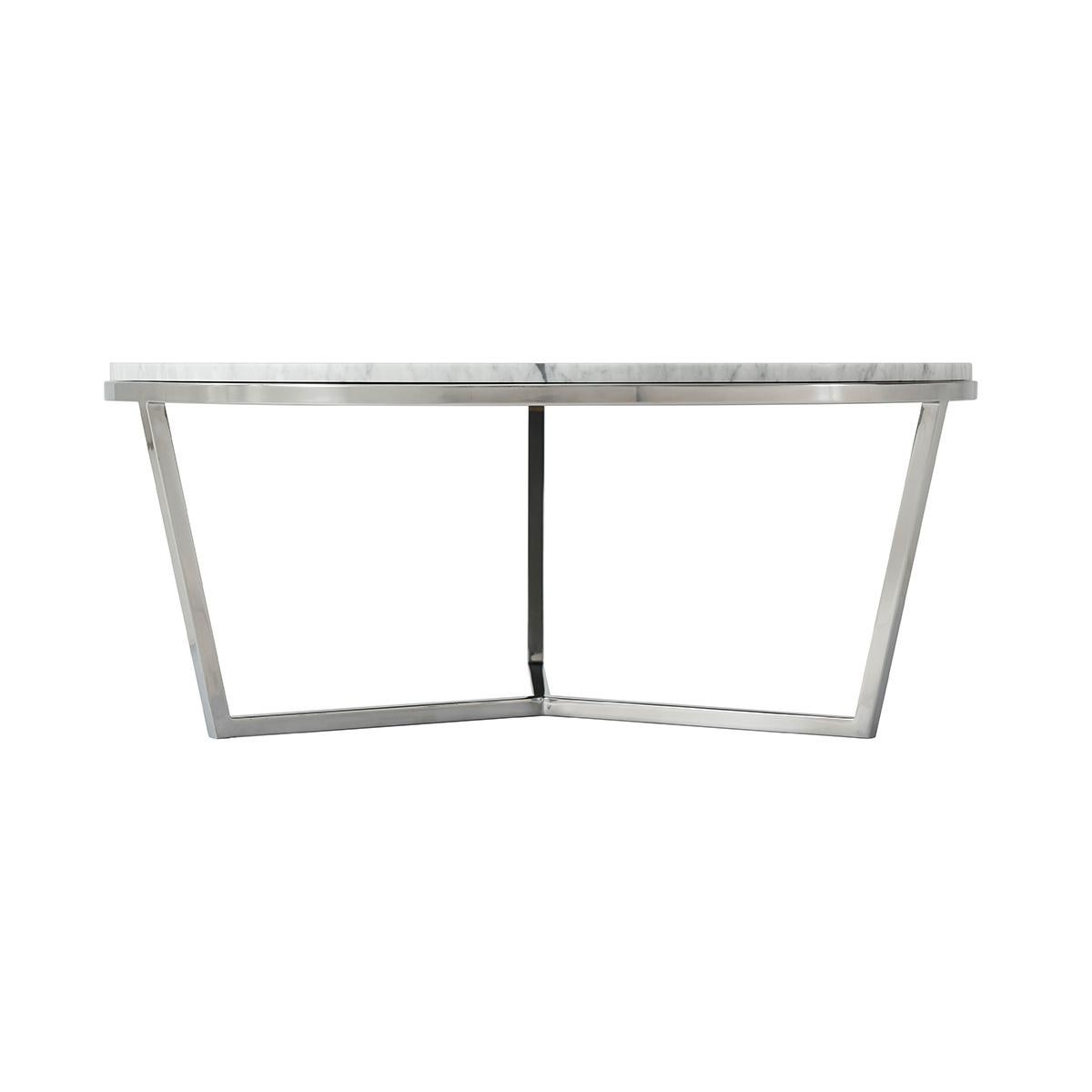 A small marble top coffee table on a polished nickel base with a stepped edge. The circular Bianco Carrara marble top sits on a modern polished three leg base.

Dimensions: 35.5