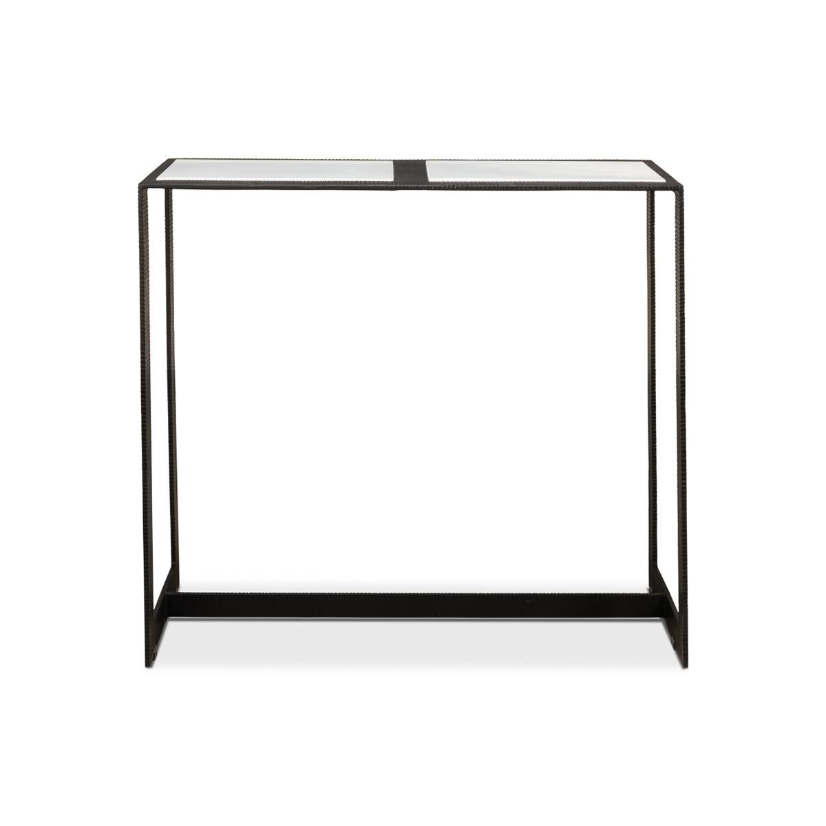 The epitome of contemporary elegance: our small Modern Marble Top Iron Console Table. With a sleek black iron frame, featuring a captivating ridged design, this piece exudes sophistication and style. The white marble top, inset flawlessly into the