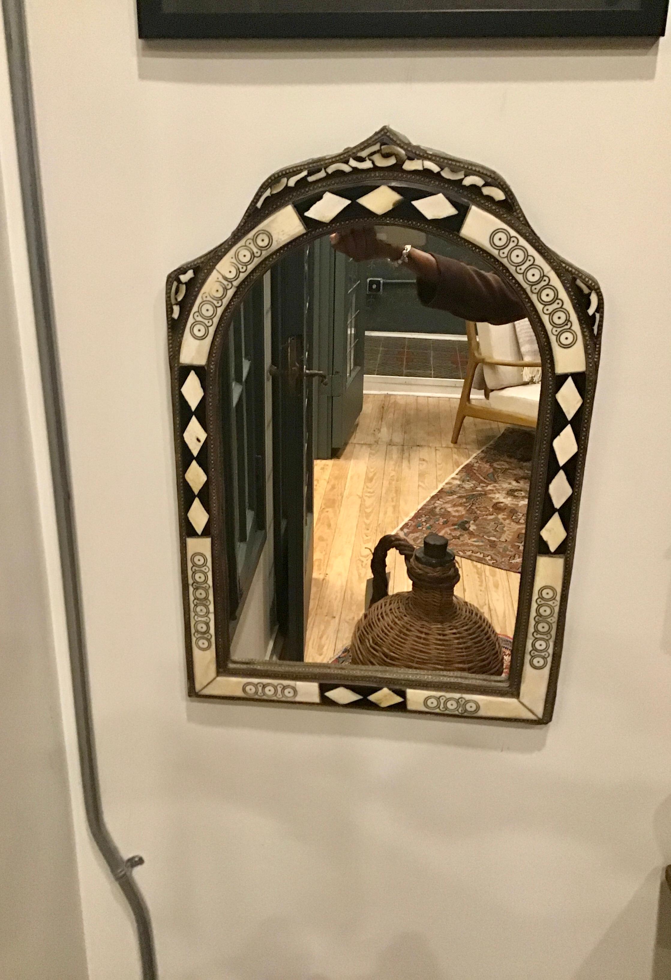 Unique Moroccan bone inlay mirror that adds elegance to any space. This timeless jewel was handcrafted with everlasting appeal which you'll love for years to come.