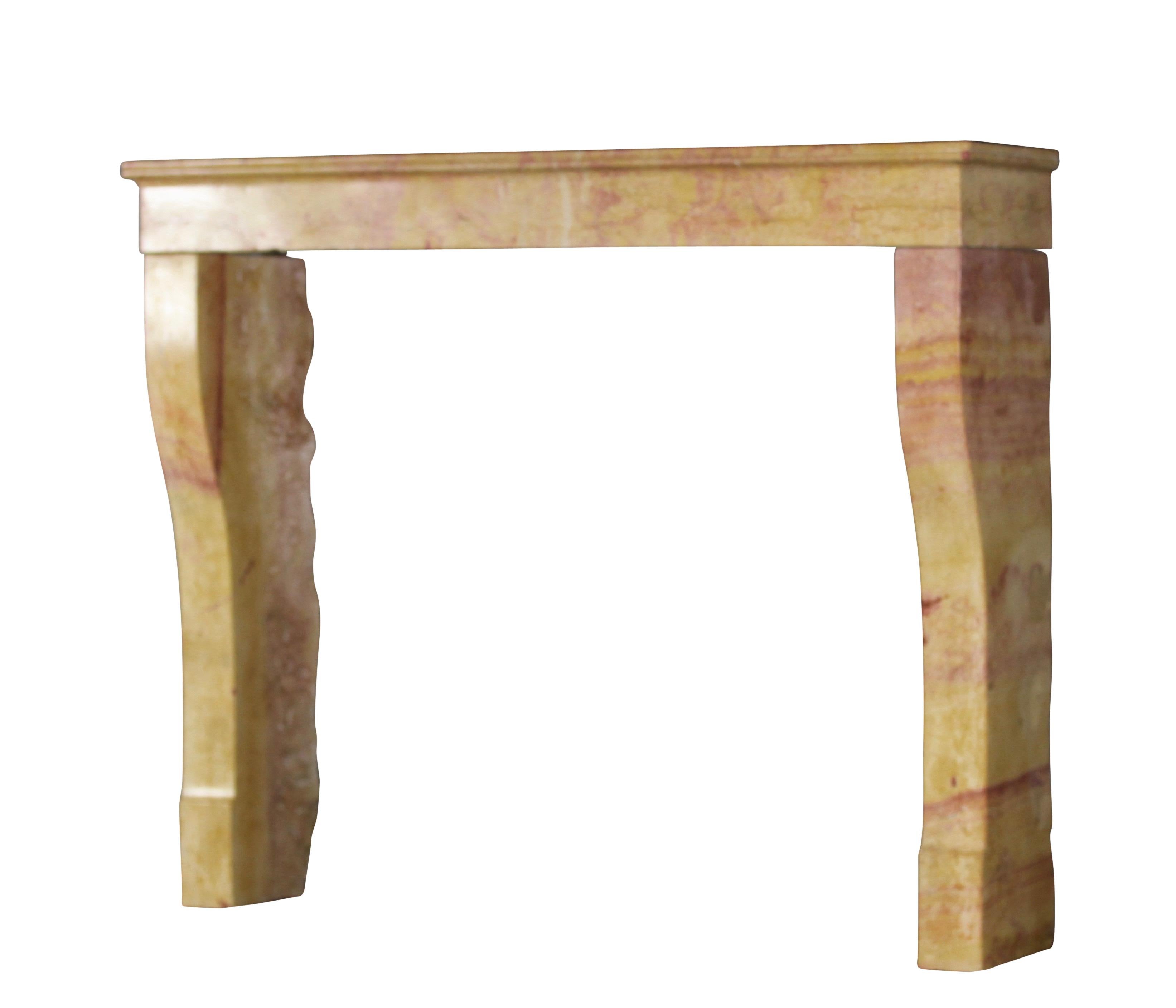 A 19th century small, Petite Bourguignon antique fireplace surround made out of the bicolor Corton hard stone/marble. Corton is a small village in the middle of the vineyards between Dijon and Beaune.
Measures:
127 cm exterior width 50 inch
105