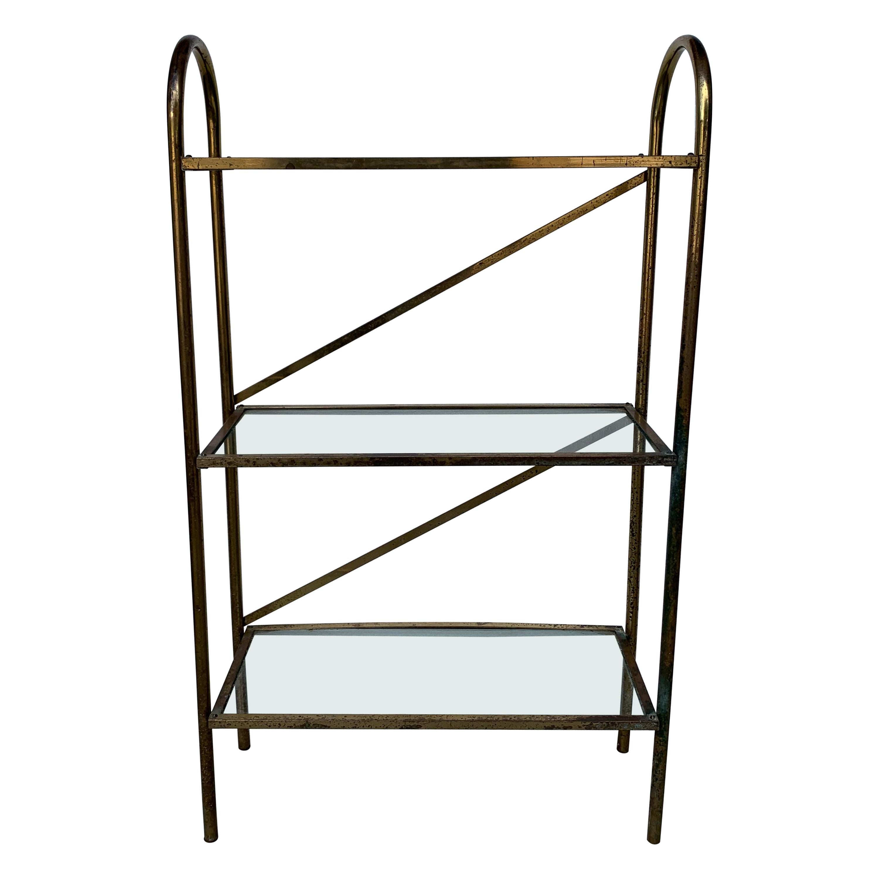 Small vintage narrow Mid-Century Modern brass and glass shelves bathroom rack shelf.