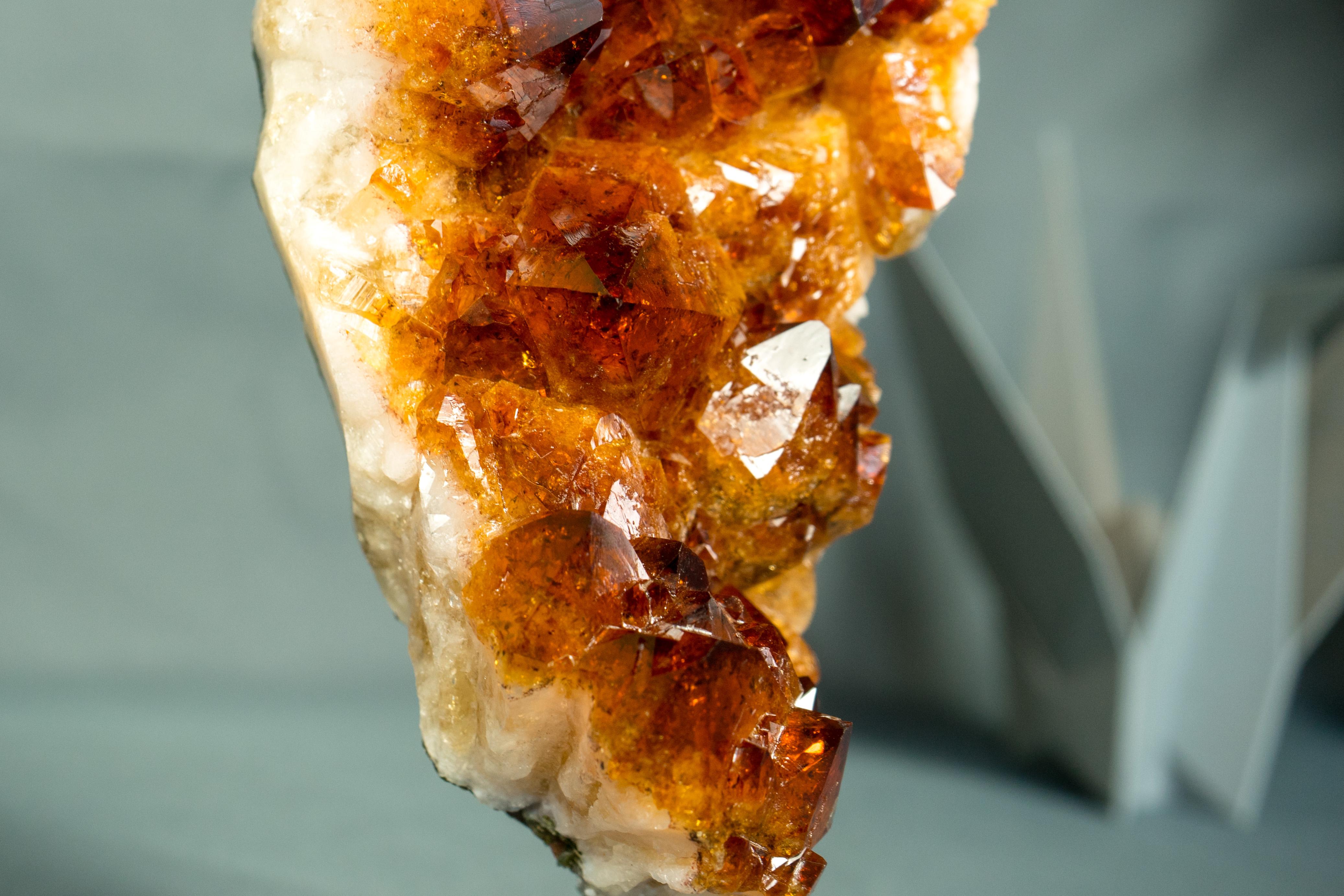 Natural Orange Madeira Citrine Cluster with Large, AAA-Grade Shiny Citrine Druzy

▫️ Description

A cherry-picked Madeira Citrine Cluster selected for its exceptional aesthetics and unique characteristics. This remarkable piece can serve as the