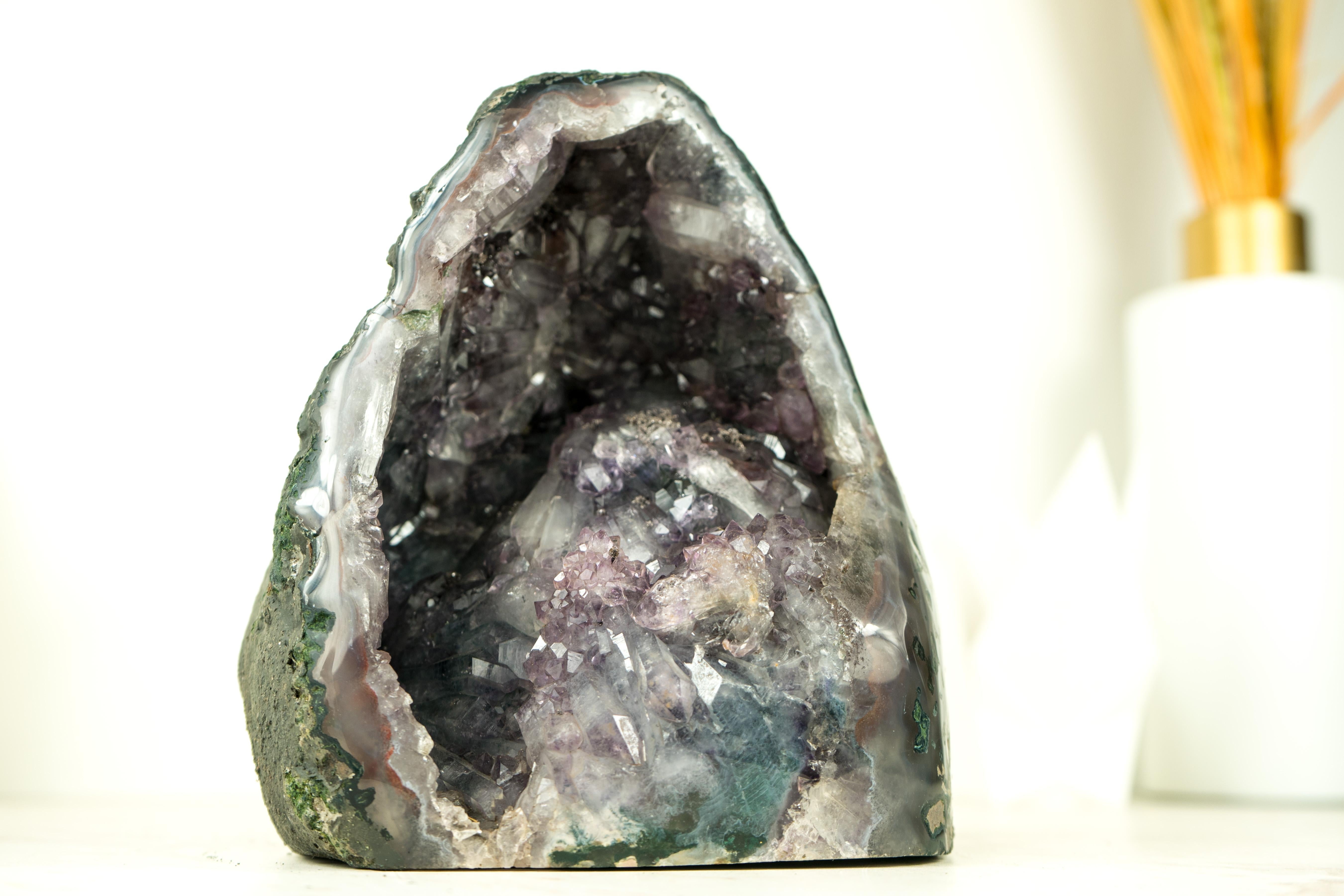 All Natural, Small Amethyst Geode with Rare Amethyst Druzy and Flower

▫️ Description

This small Amethyst Geode is a natural masterpiece, showcasing a stunning formation, rarely seen druzy, and an Amethyst flower forming. Its unique composition