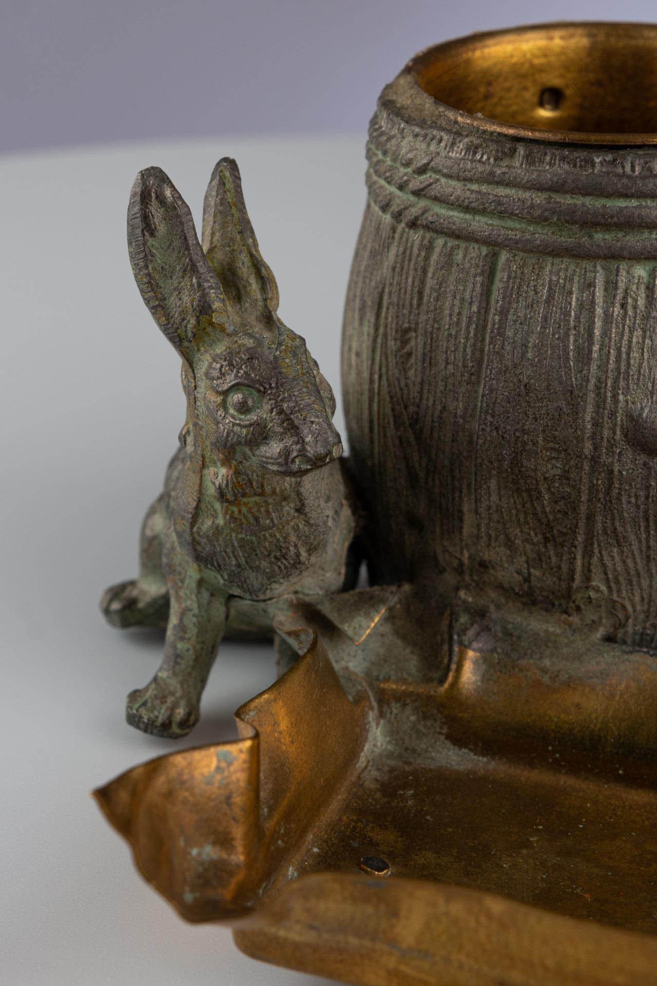 Small naturalistic desk set with rabbit and barrels made of patinated metal For Sale 5