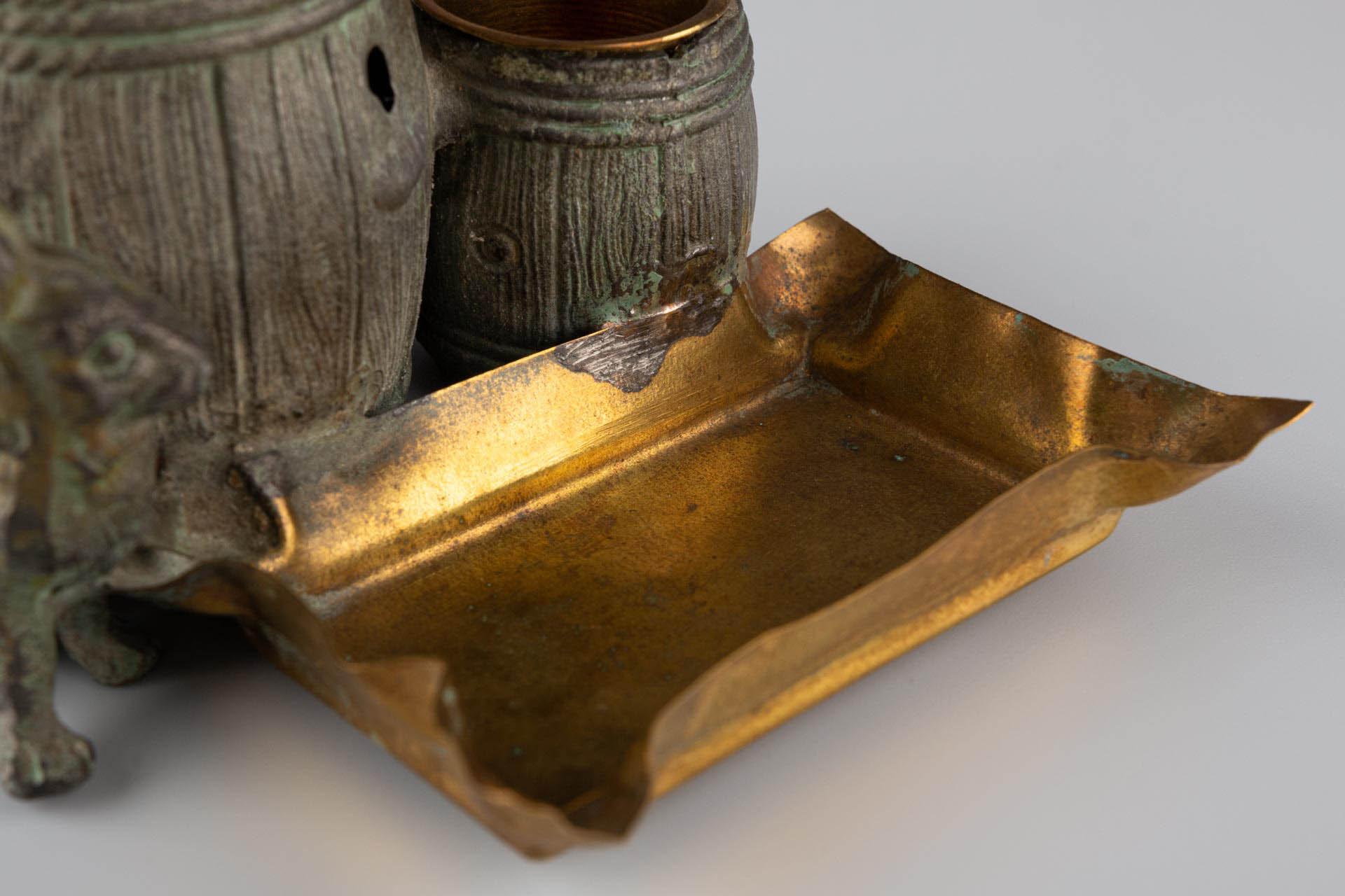 Small naturalistic desk set with rabbit and barrels made of patinated metal For Sale 8