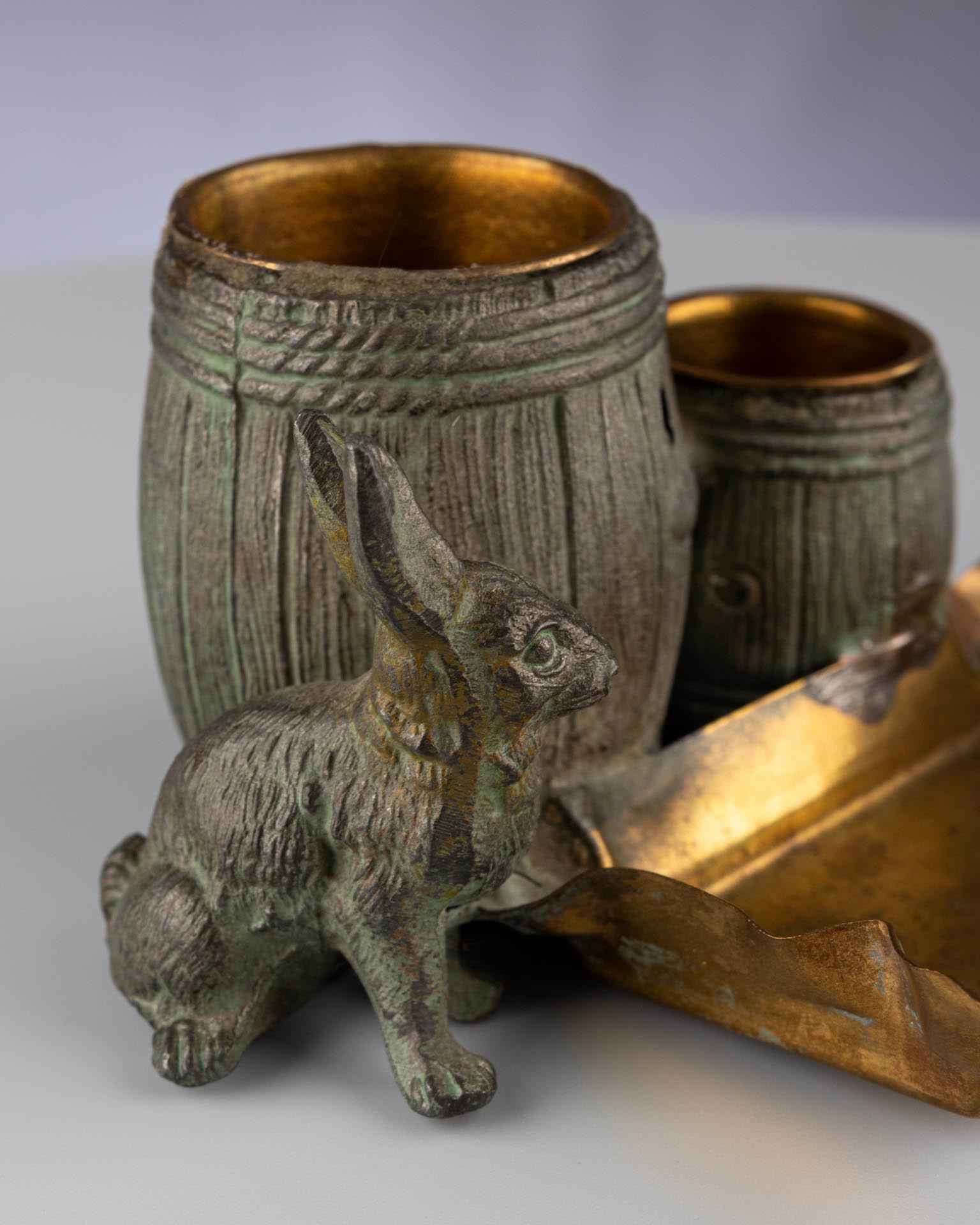 Small naturalistic desk set with rabbit and barrels made of patinated metal For Sale 9