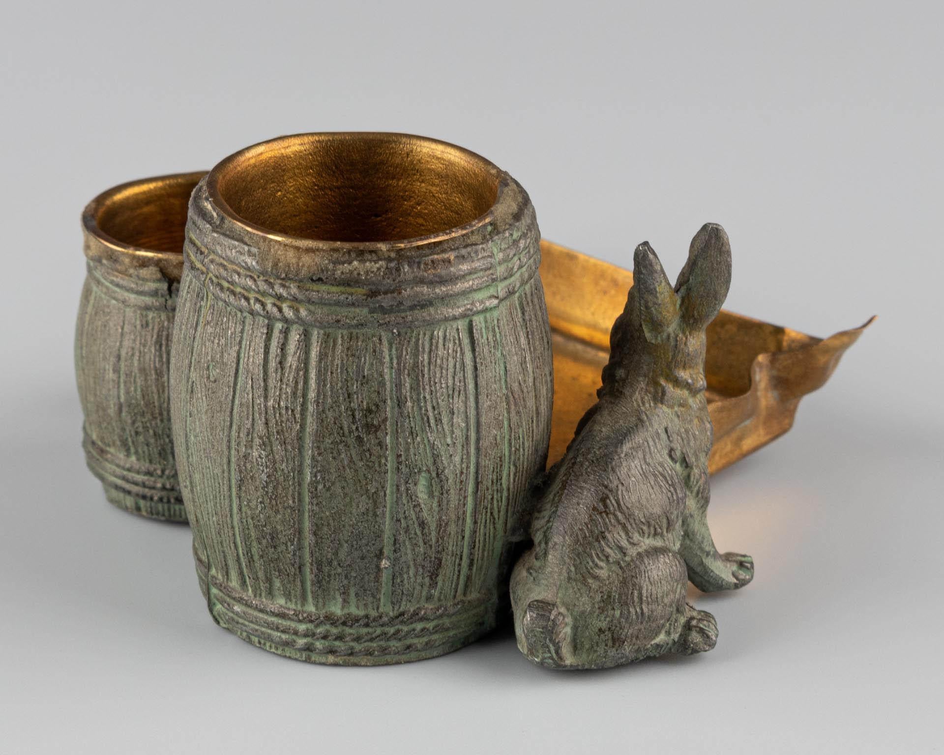Small naturalistic desk set with rabbit and barrels made of patinated metal For Sale 2