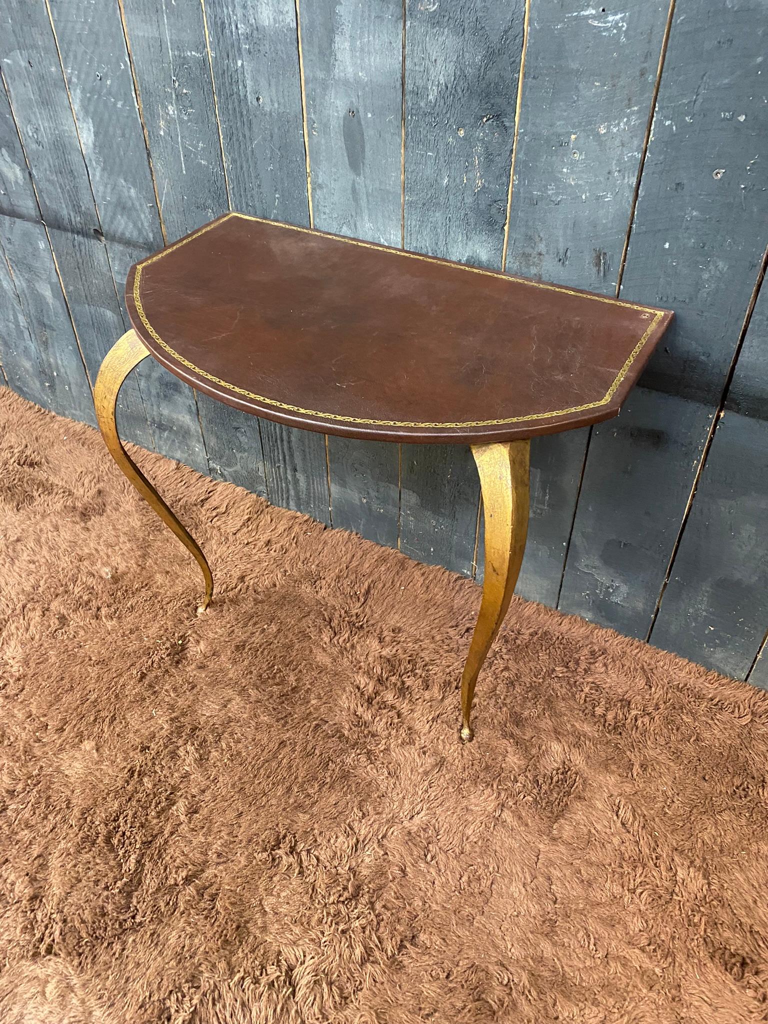 Small  neo classique Console in brass and faux leather circa 1950
Console to fix on the wall.
