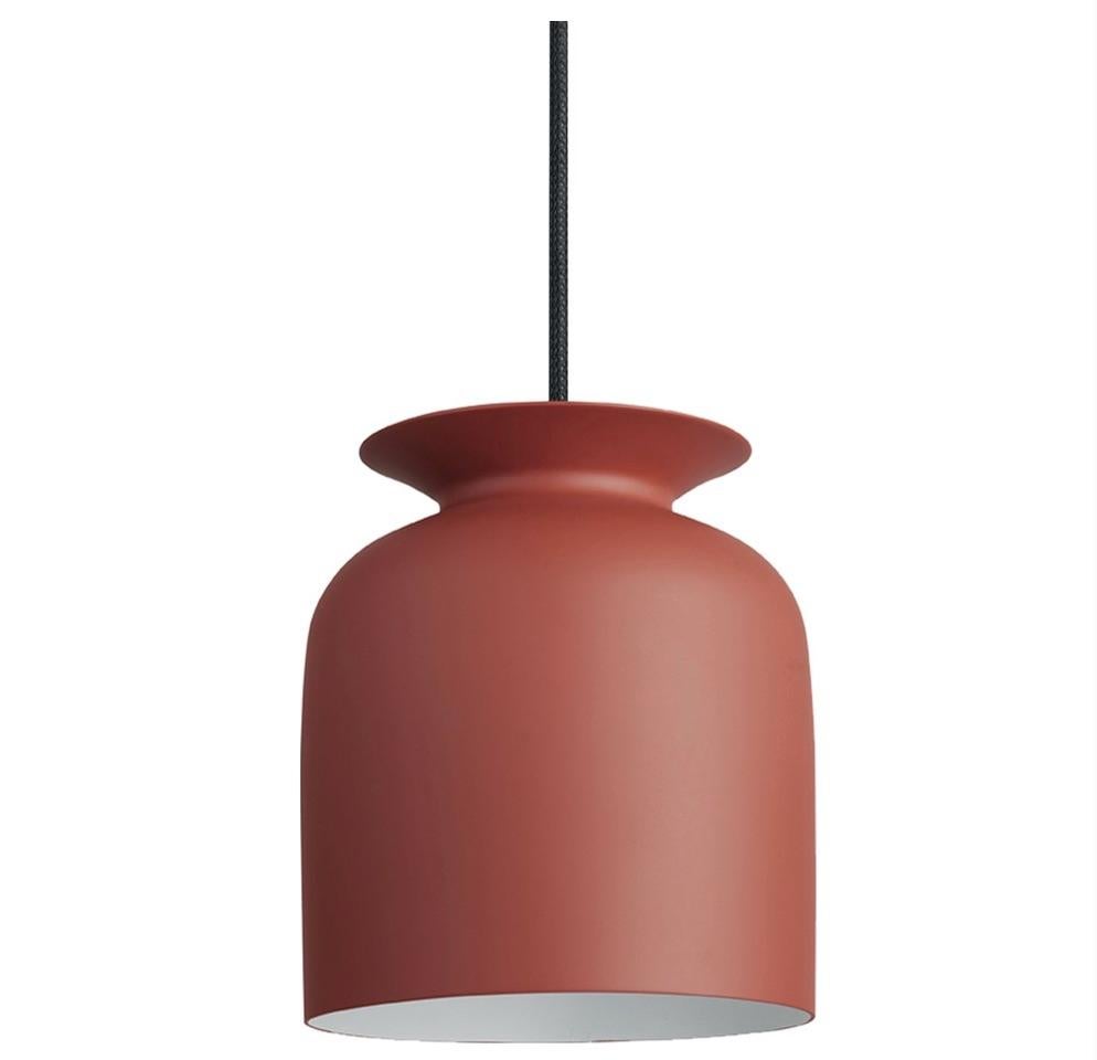 Small Oliver Schick 'Ronde' pendant in redwood matte for GUBI. 

Designed by Oliver Schick, the Ronde pendant has an industrial yet modern look that is well-suited for both home decor and professional environments. Executed in spun aluminum with