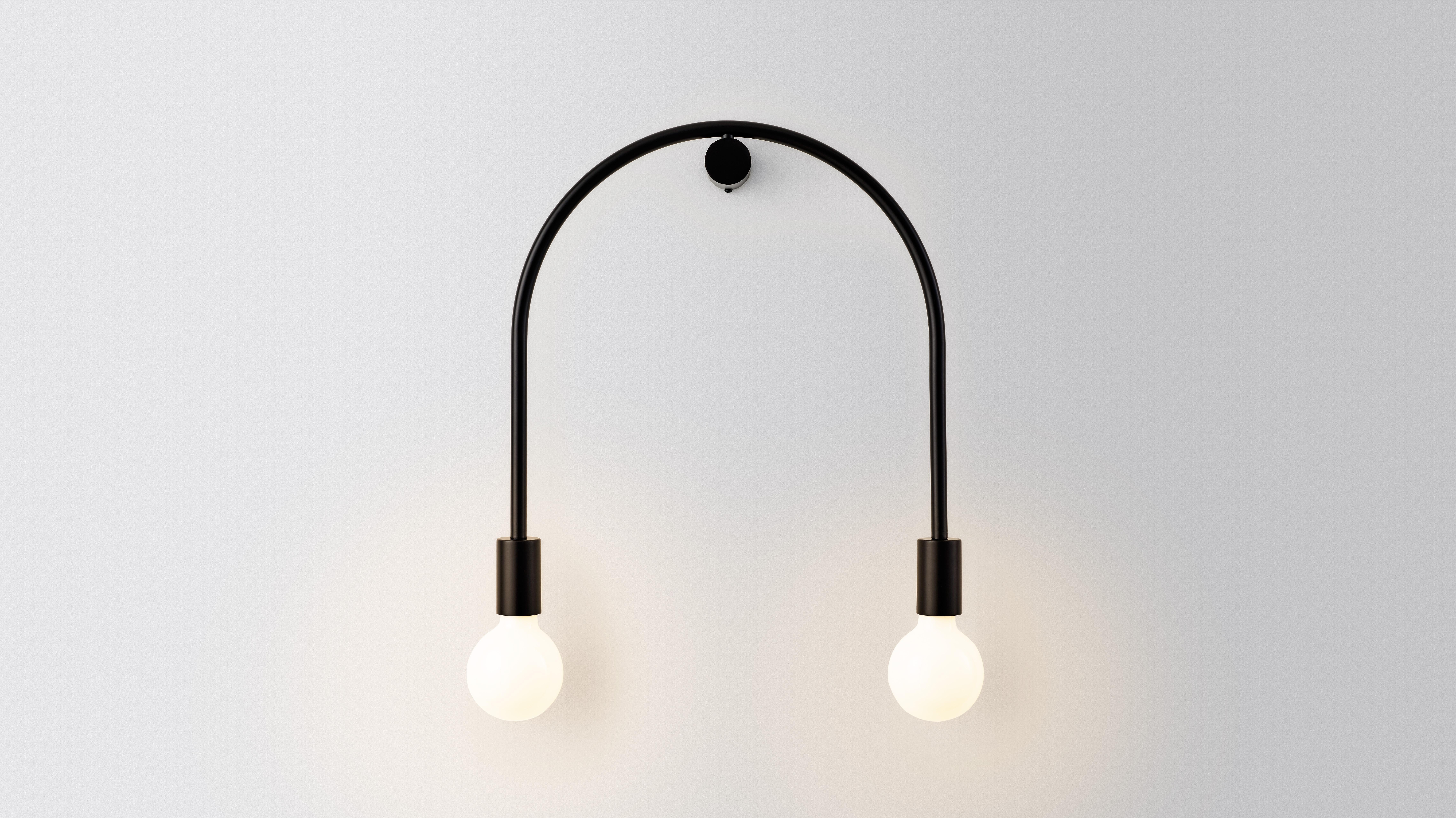 Small only U pendant light by Volker Haug
Dimensions: D 8 x W 24 x H 42 cm 
Material: Brass. 
Finish: Polished, aged, brushed, bronzed, blackened, or plated
Lamp: 240V E27 (120V E26 US) (pictured with L087 95mm opal LED) x 2
Weight: