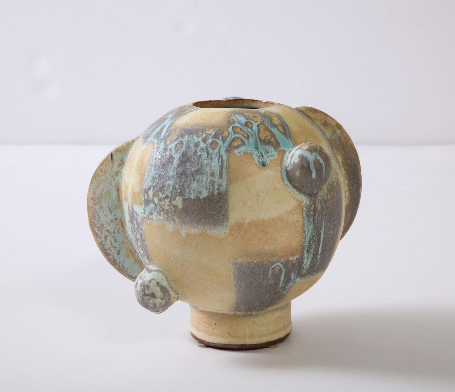 Small orb vase #1 by Robbie Heidinger. Hand-built stoneware vase. Artist-signed on bottom.
  