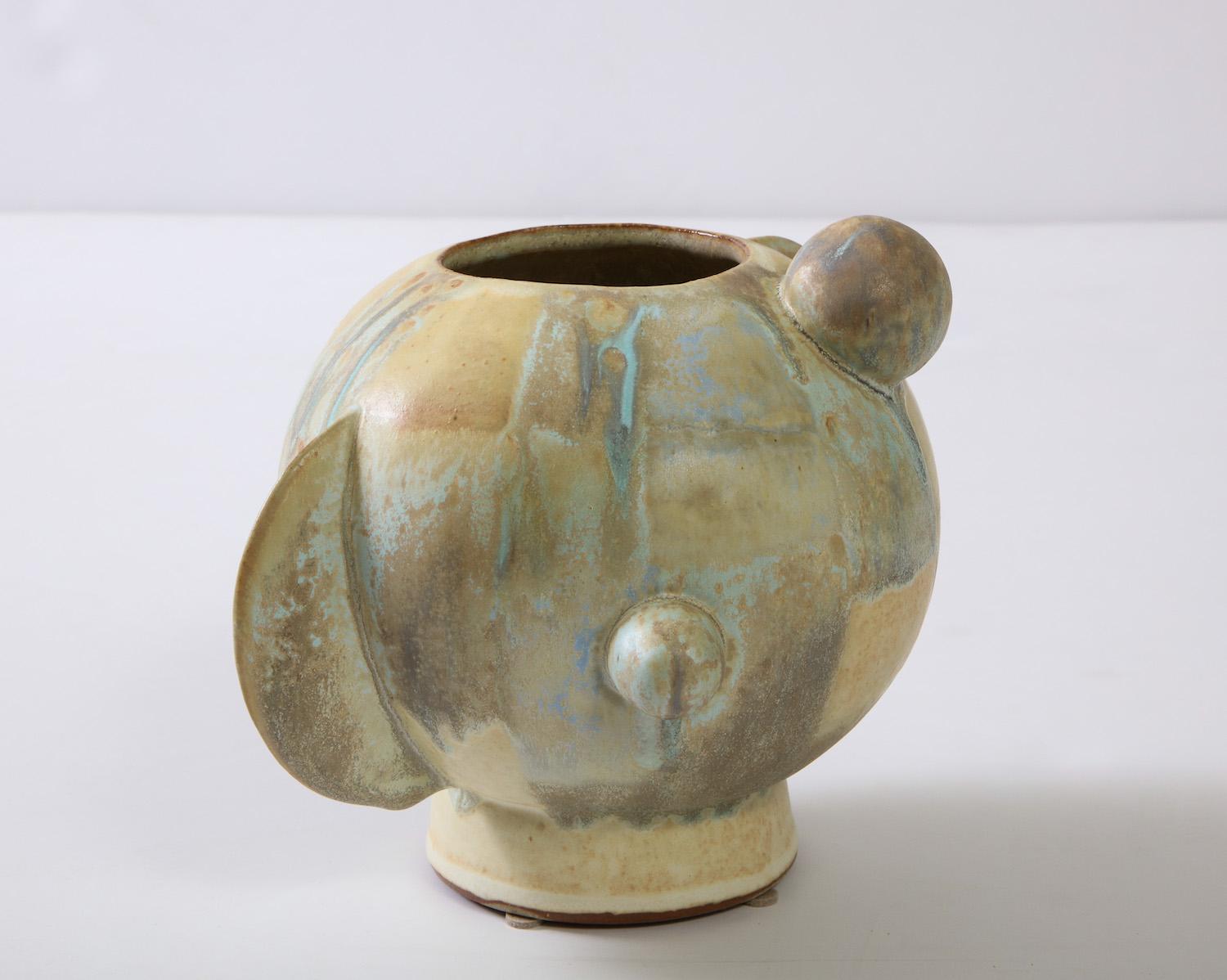 Small orb vase #2 by Robbie Heidinger. Hand-built stoneware vase. Artist-signed on bottom.


  