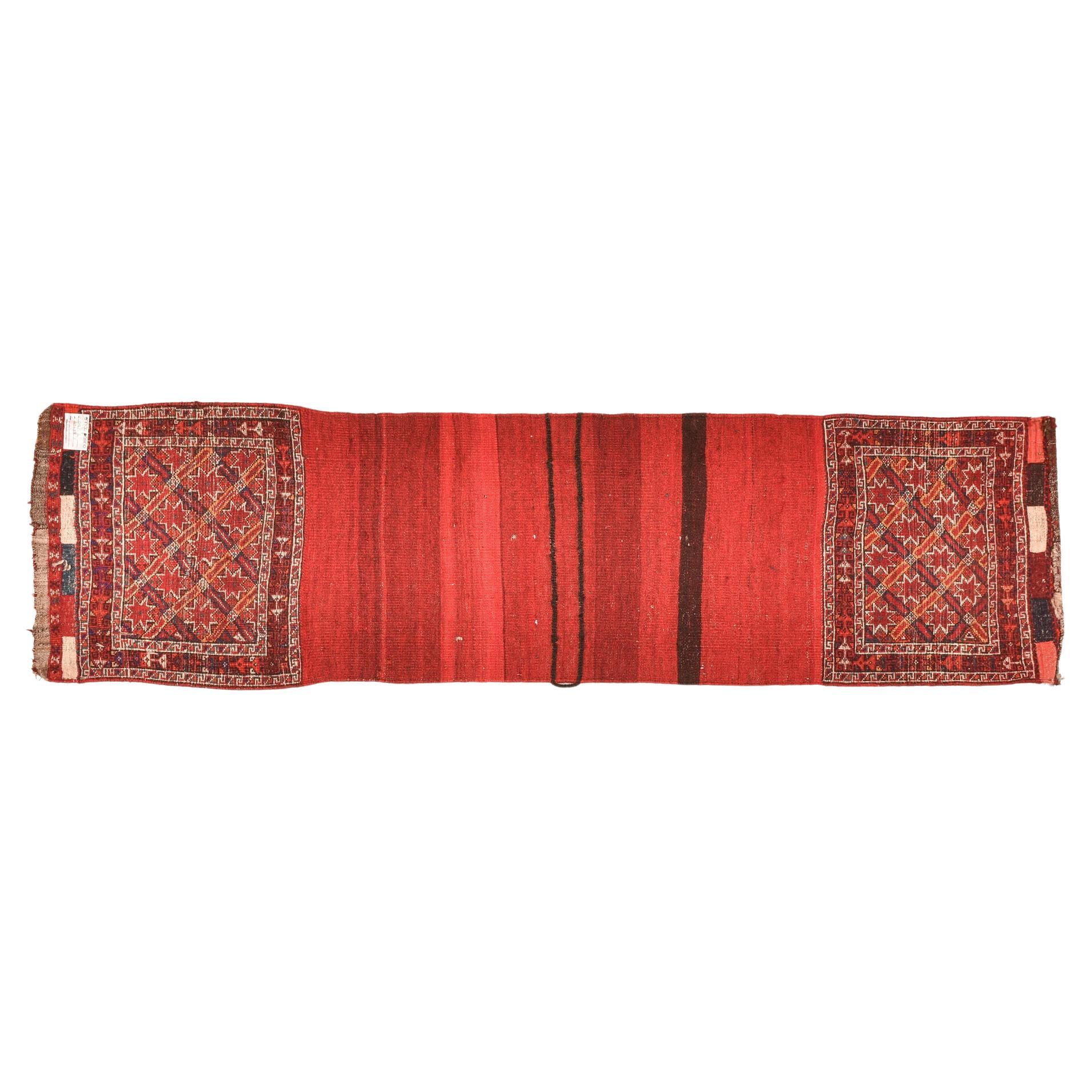 Small runner made from a nomadic saddlebag, only unstitched on the sides, but intact in its workmanship, colors and beauty.
I love te star design: it also requires weaving skills.
It's perfect everywhere, also on wall.

ref. nr. 134.