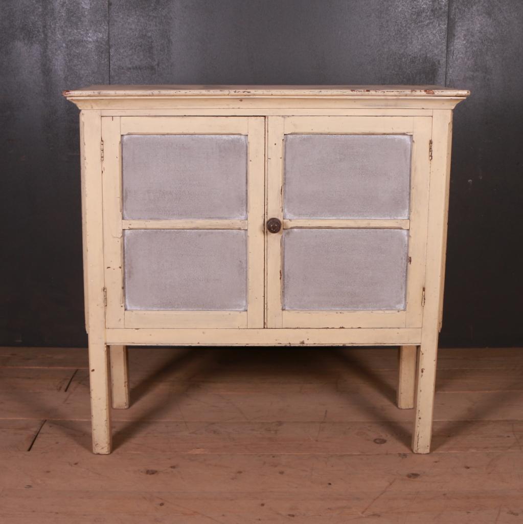 Small 19th C Scottish two door food cupboard with original paint, 1880.

Dimensions
41.5 inches (105 cms) wide
16.5 inches (42 cms) deep
40.5 inches (103 cms) high.