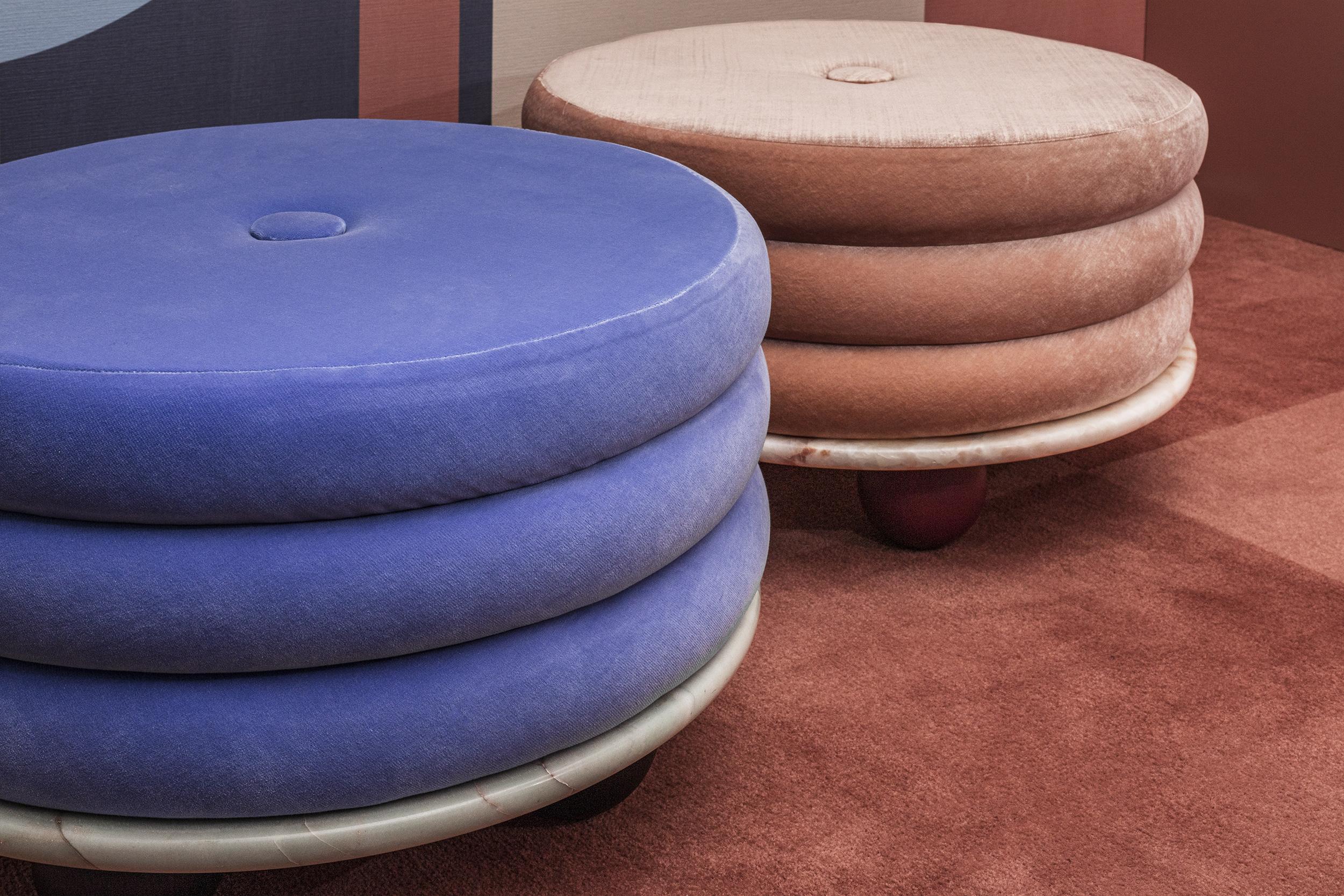 This collection aptly gets its name from the multi-tiered design of its tables and ottomans. Each piece is constructed of Mohair fabric sourced from the Netherlands, a precisely cut slab of marble, and hand-crafted oak legs.

Retreat to your very