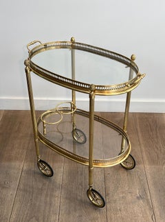 Small Oval Brass Rolling Table with Double Removable Tops from Maison Bagués