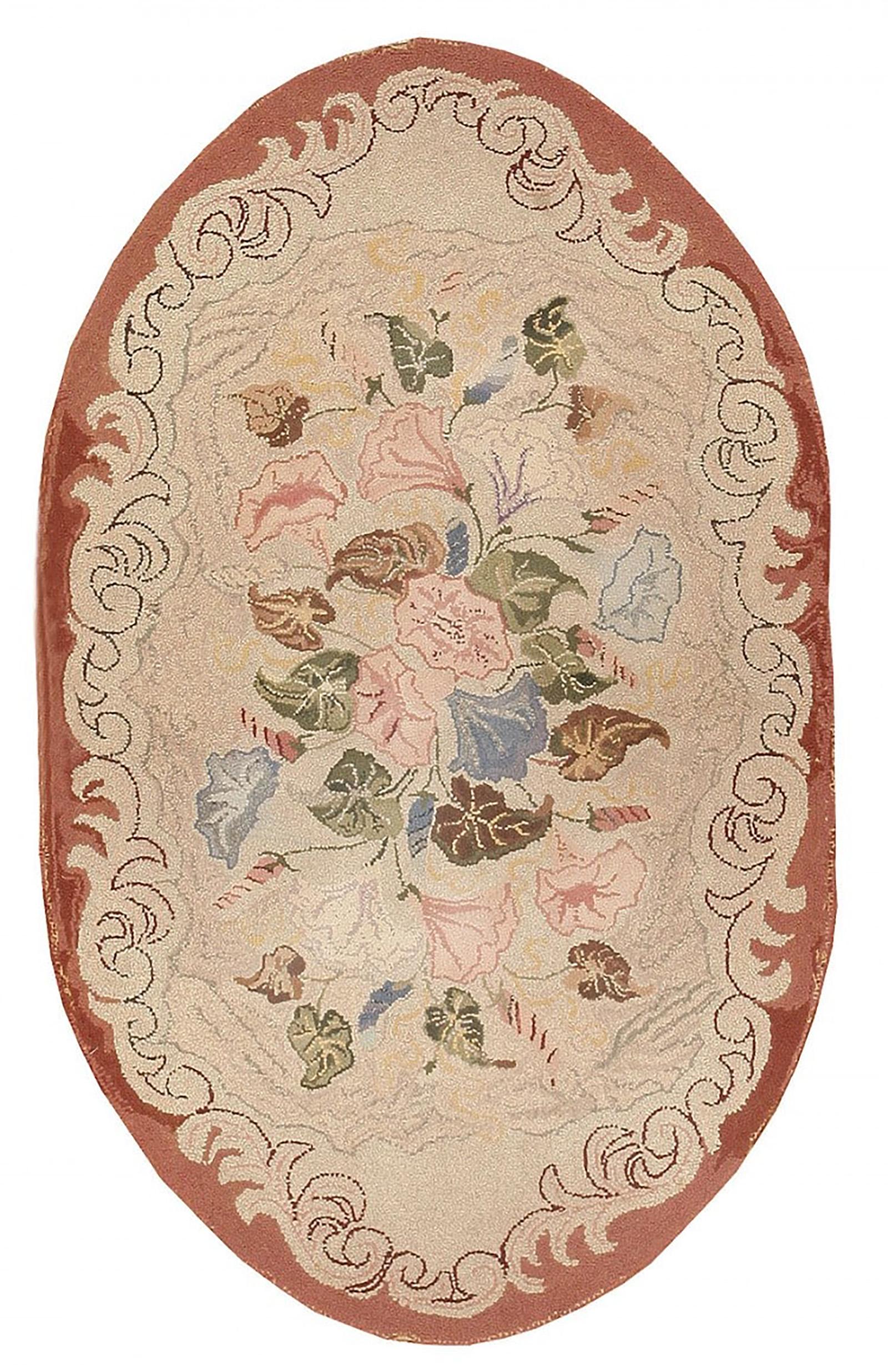 Small Oval Shaped Floral Design Antique American Hooked Rug, Country / Origin: America, Circa / Date: Late 19th Century
