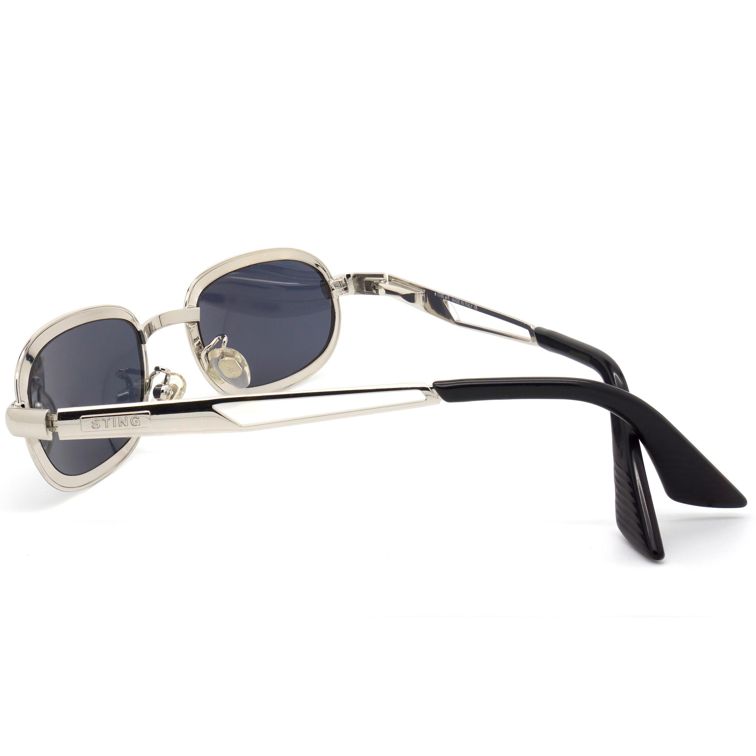 Noir Petites lunettes de soleil ovales vintage de Sting, Italie  en vente