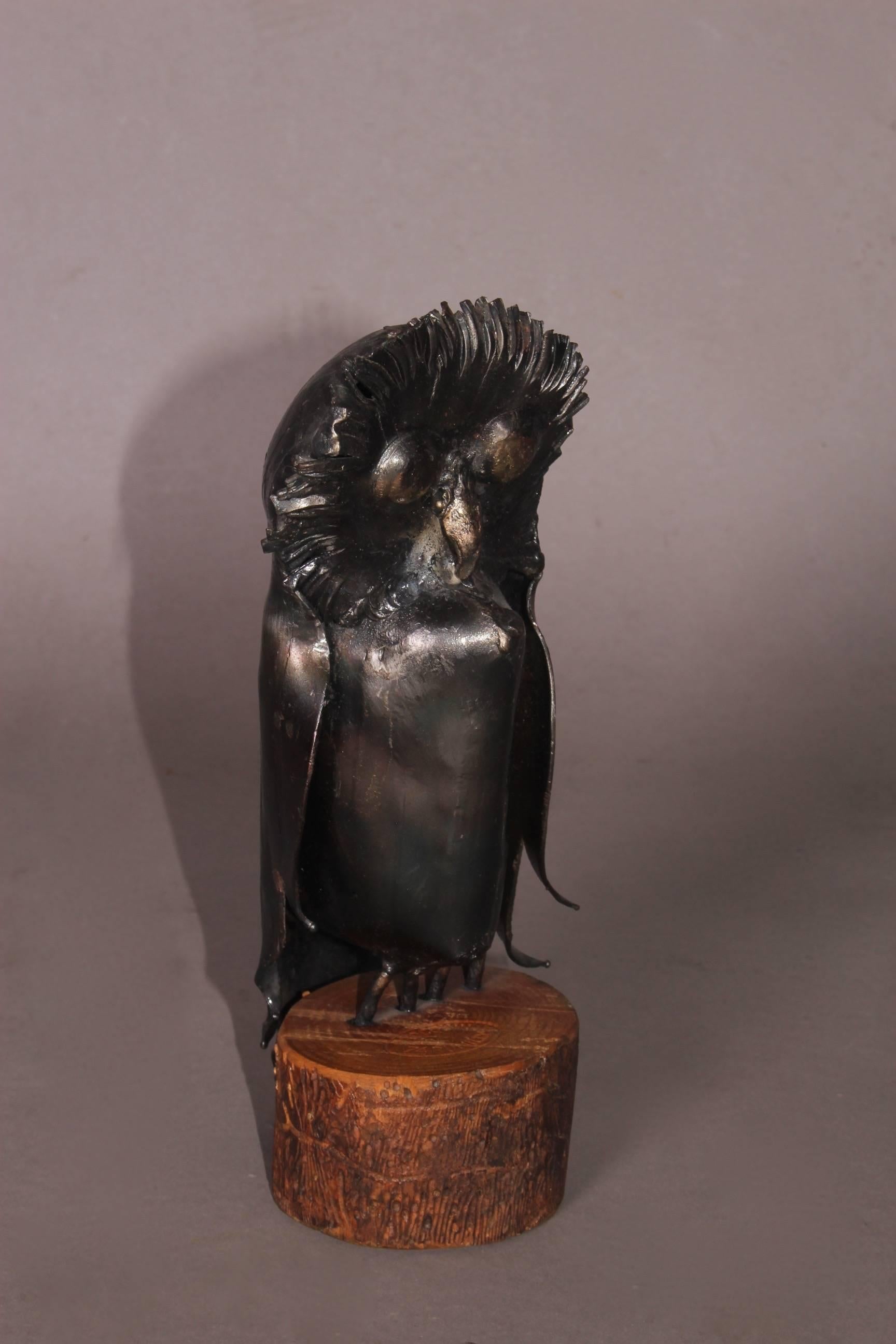 Small owls metal sculpture.