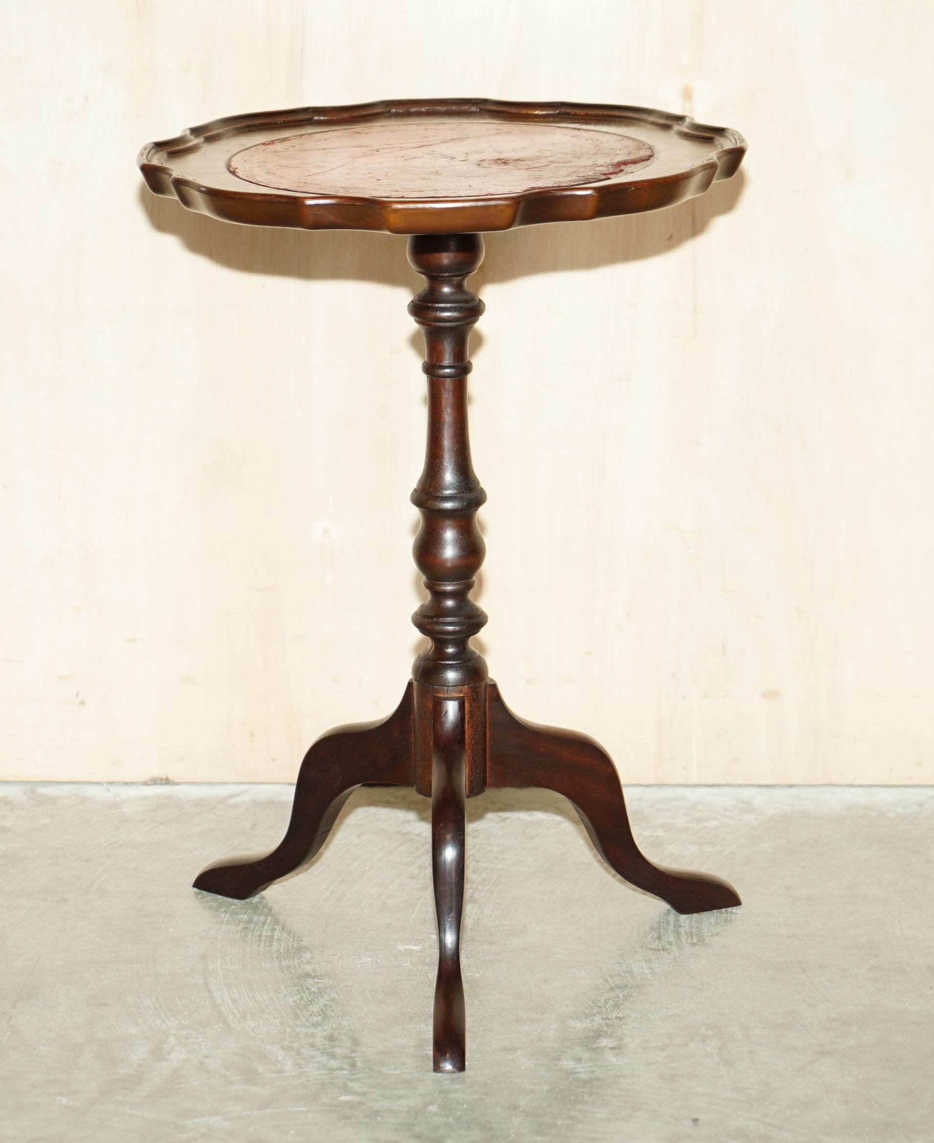 We are delighted to offer for sale this lovely vintage beech, Oxblood leather topped lamp or side table with silver leaf inlaid border 

A good-looking well-made tripod table in good, we have cleaned waxed and polished it from top to bottom, there