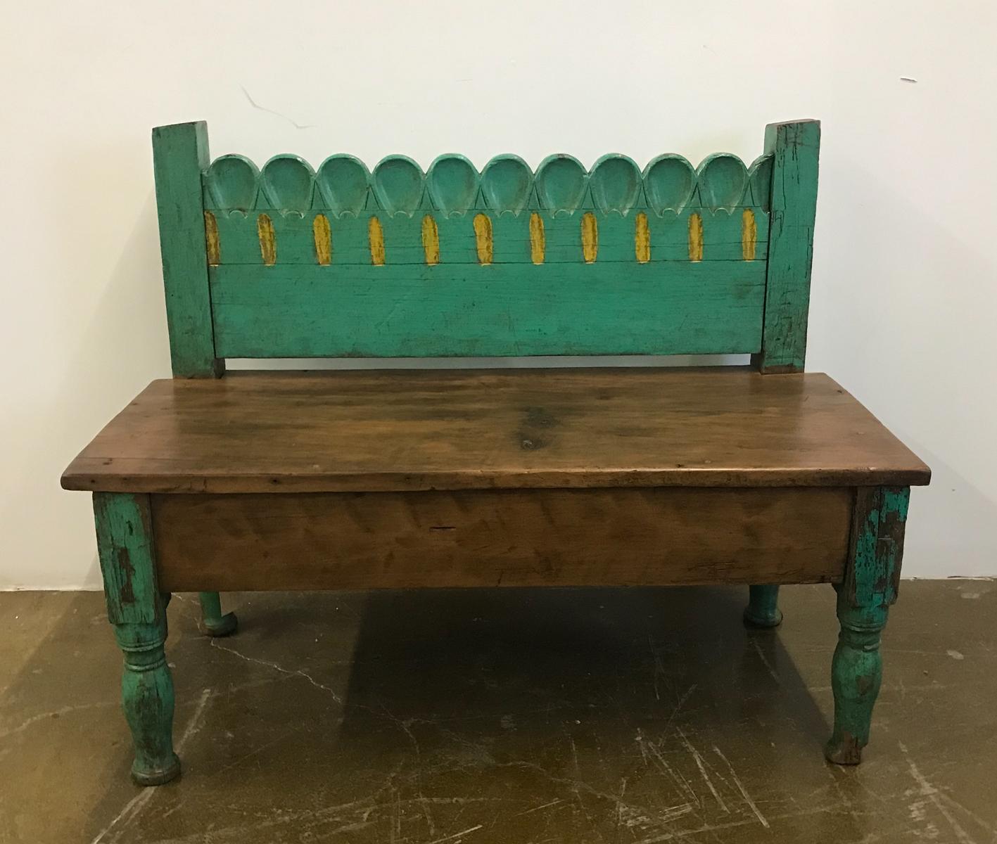 Small painted bench, refashioned from an old, 19th c bed. New construction so it is very sturdy. Turned legs. Yellow and green original paint