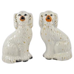 Small Pair of Antique Staffordshire Hand Painted Pottery Dog Figurines