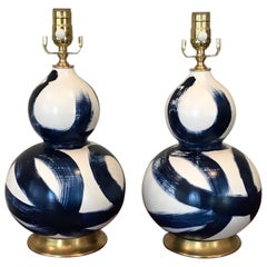 Small Pair of Blue and White Ceramic Double Gourd Shape Lamps on Gilt Bases
