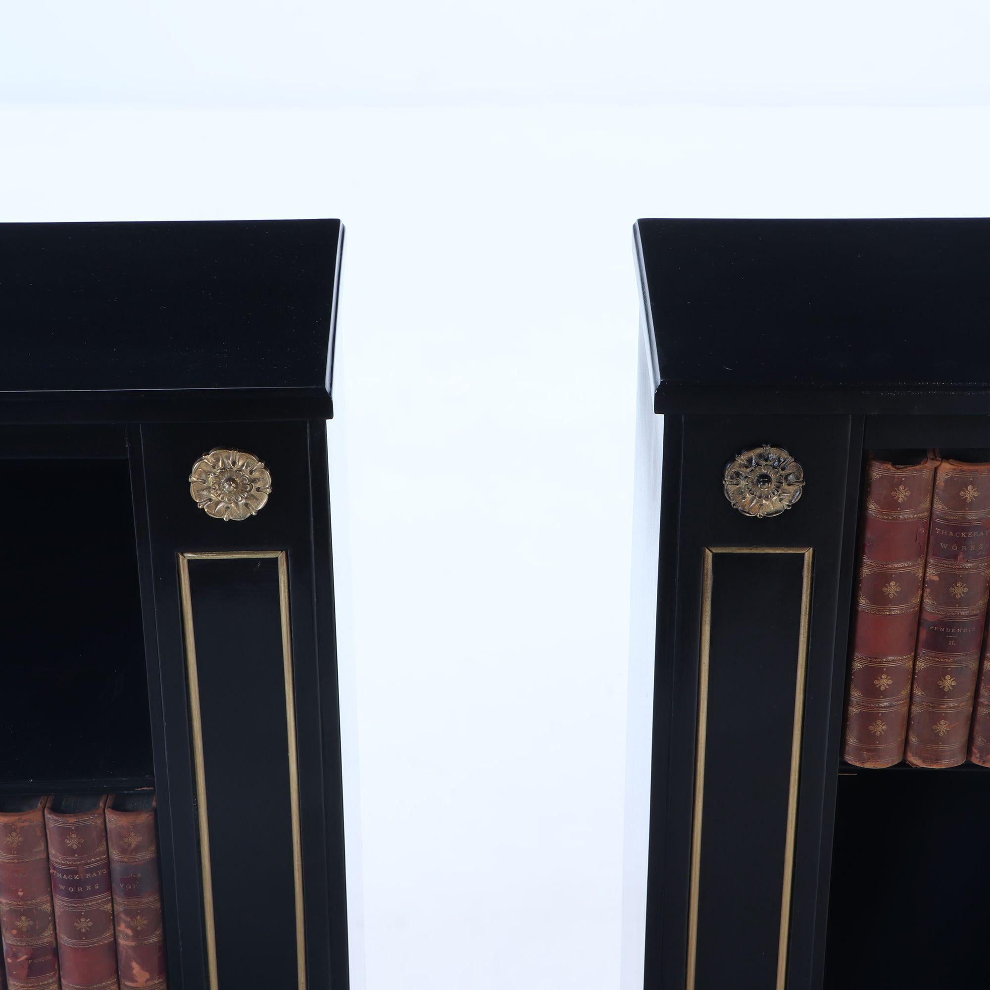 Small pair of ebonized open bookcases having bronze circa 1940. In Good Condition For Sale In Philadelphia, PA