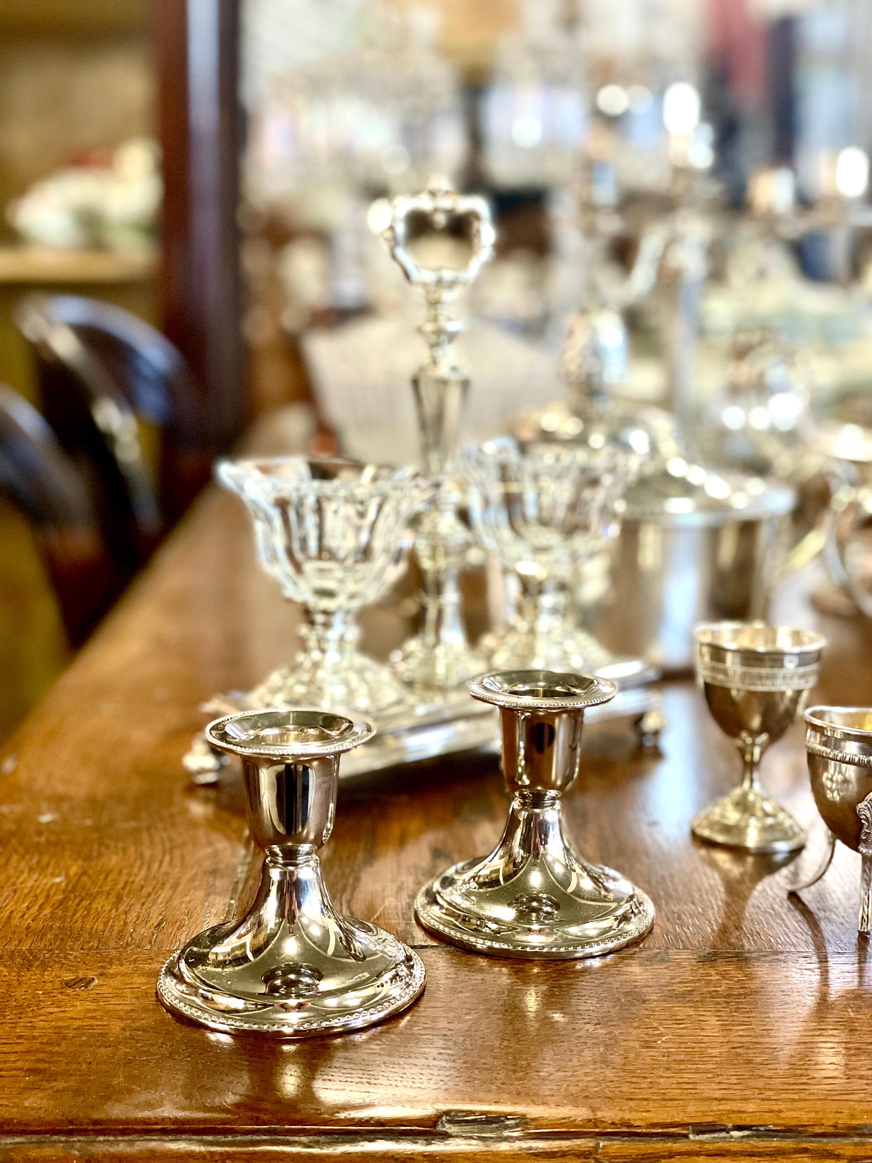 Pair of Louis XVI Style Silver-Plated Candlesticks In Fair Condition For Sale In LA CIOTAT, FR