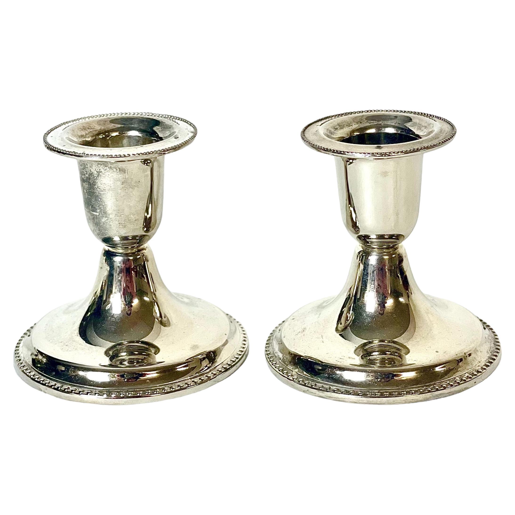 Pair of Louis XVI Style Silver-Plated Candlesticks