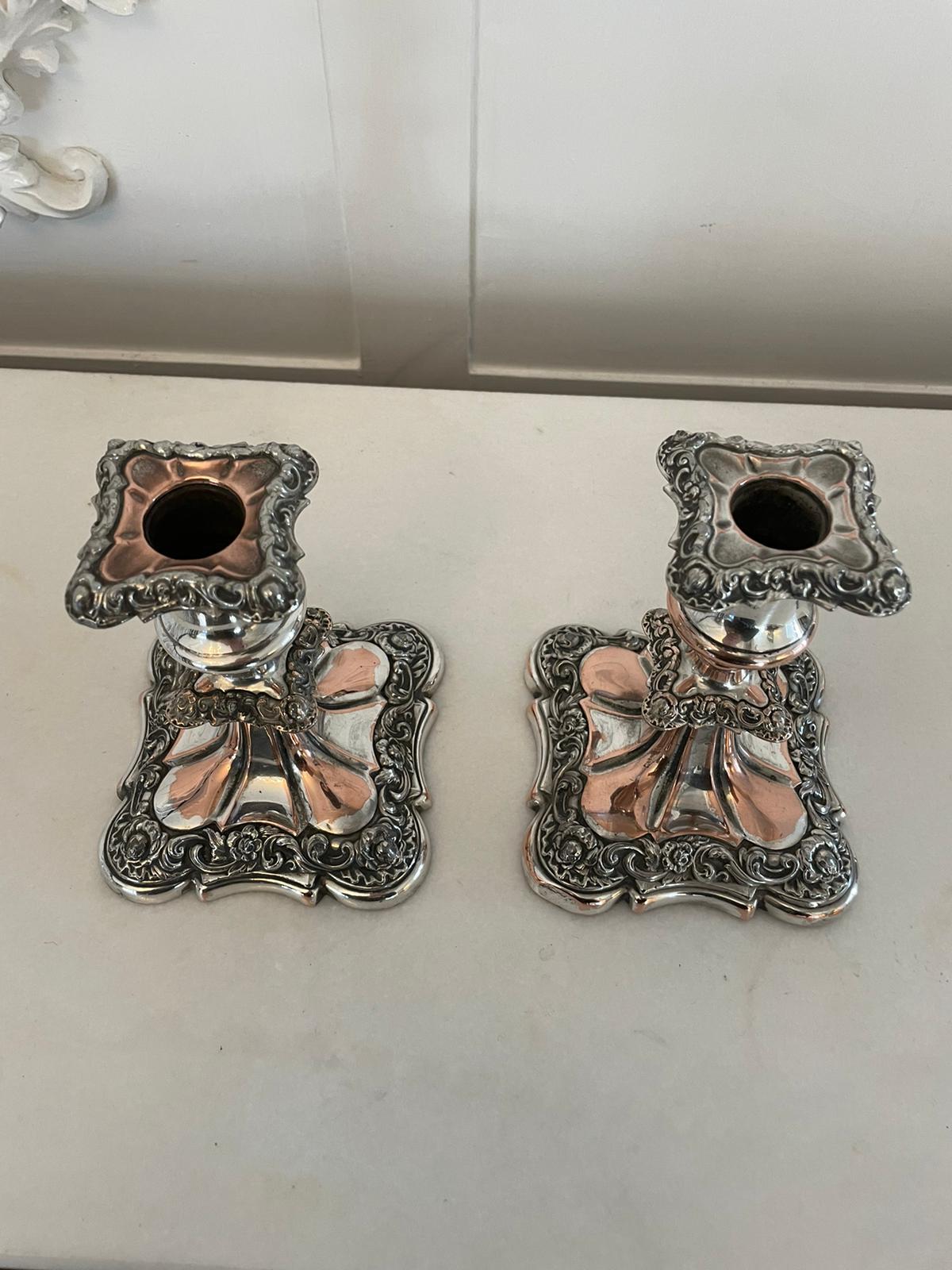 Small pair of quality antique Victorian Sheffield plated candlesticks having a quality small pair of antique Victorian Sheffield plated candlesticks with ornate decoration 

H 14 x W 11.5 D 11.5cm
Date 1880.
 