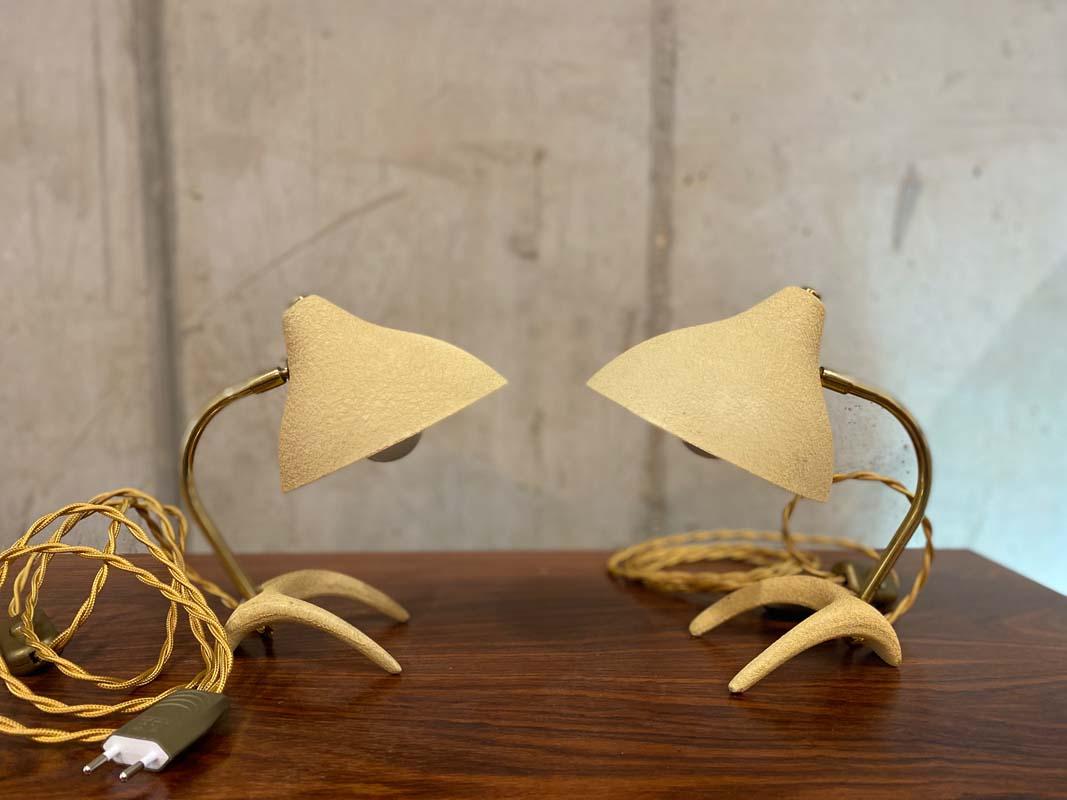 Small pair of table lamps by Louis C. Kalff for Cosack brothers, 1950s. These 2 delightful little table lamps charmed me right away. This is because the two little lamps have the typical Louis C. Kalff crow foot. A brass stem connects the base and