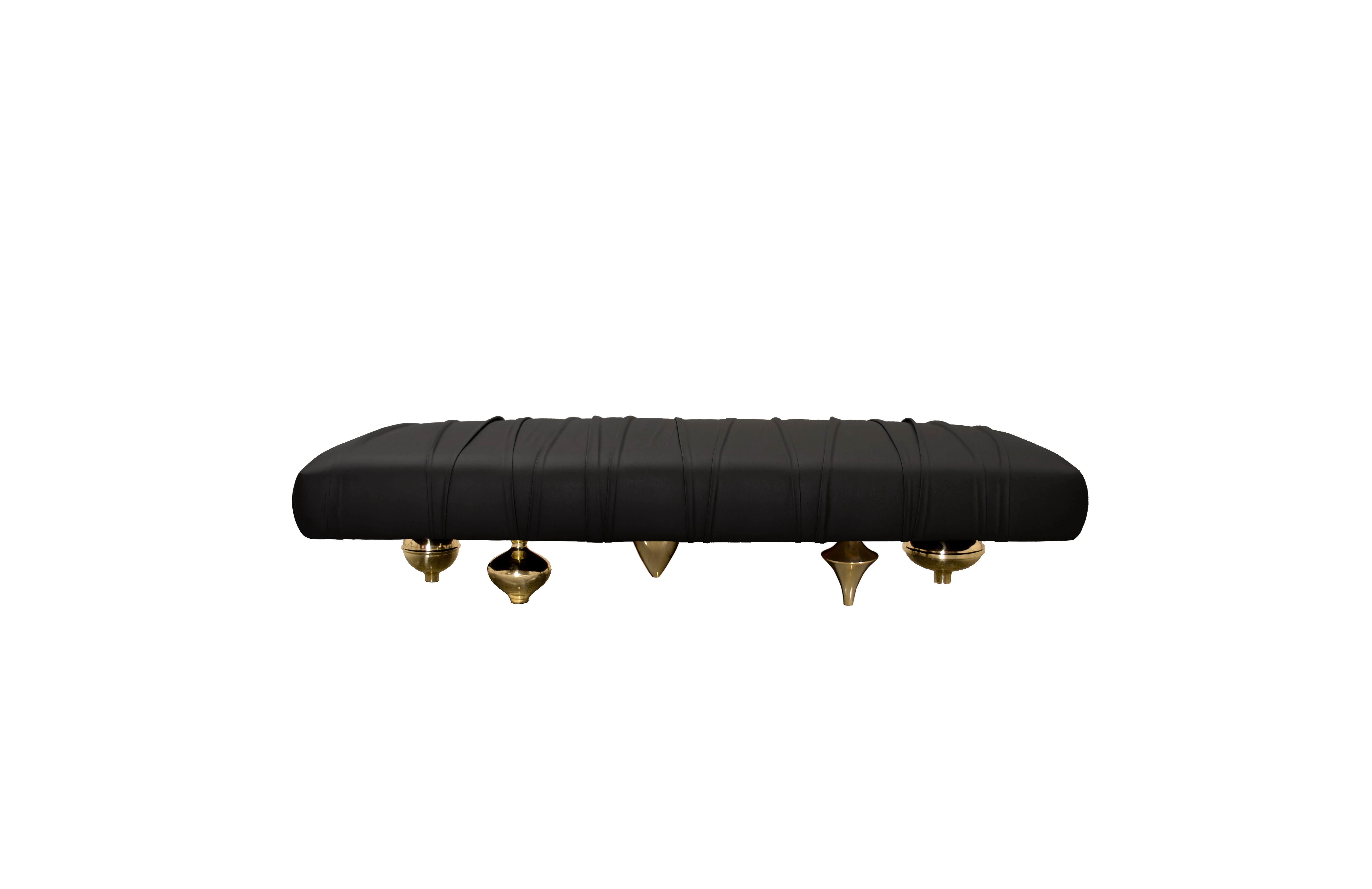 Small Panca Bench by Il Pezzo Mancante
Dimensions:  W 140 x D 50 x H 46 cm
Materials: Upholstery: fine quality leather or velvet.
Brass casting base: satin brass / bronze / gold / nickel.
Weight: approx 43 Kg 

Il Pezzo Mancante (