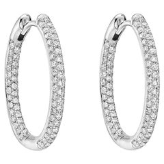 Small Pavé Diamond Hoop Earrings
0.75 Carat
Small Pavé Diamond Hoop Earrings
0.75 Carat