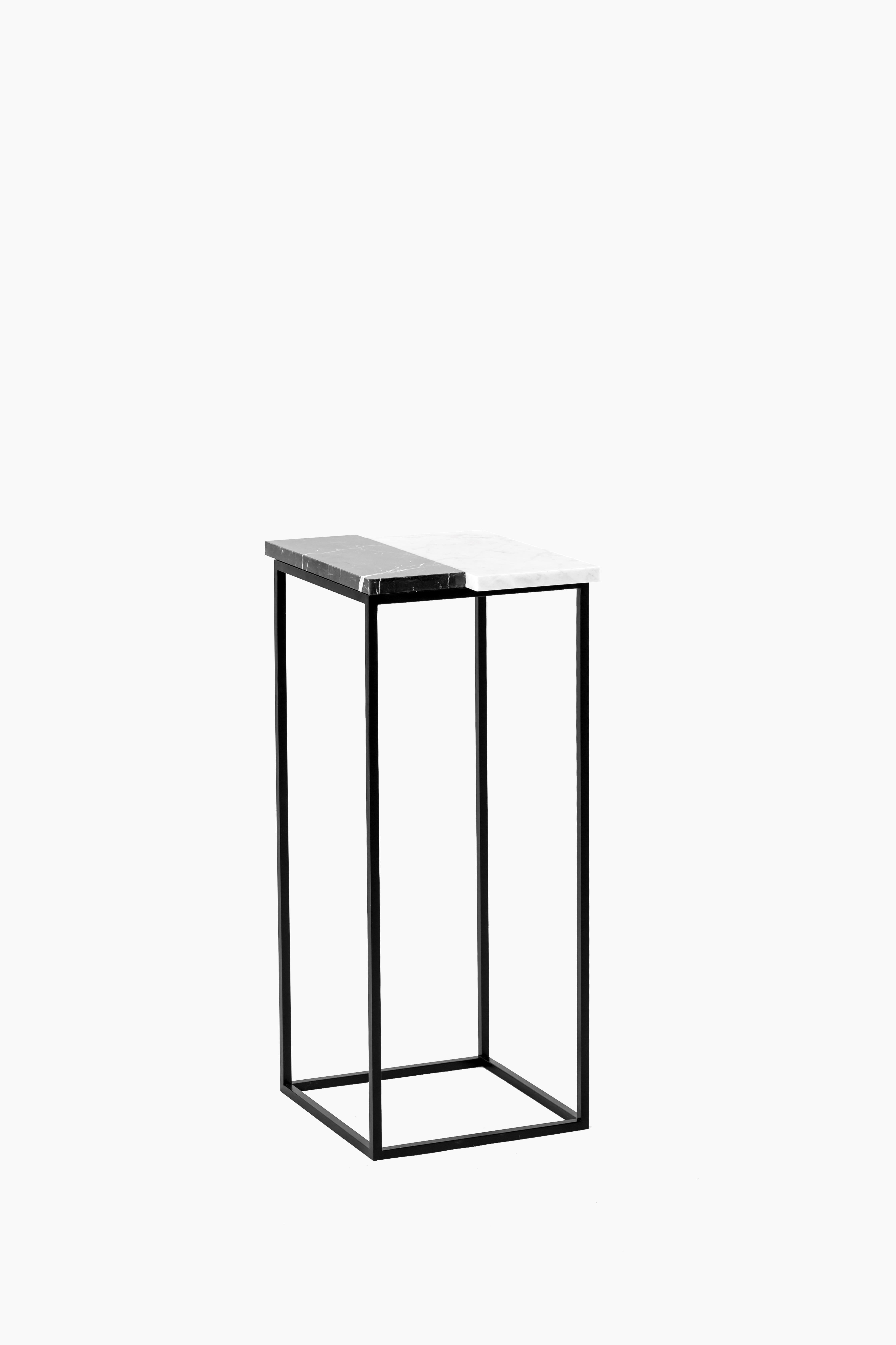 Small Piano Side Table by Un’common
Dimensions: W 30 x D 30 x H 42 cm
Materials: Marble

The PIANO pillar combines white Carrara marble with the black Marquina marble. With a slightly offset joint between the two types of marble, PIANO can certainly