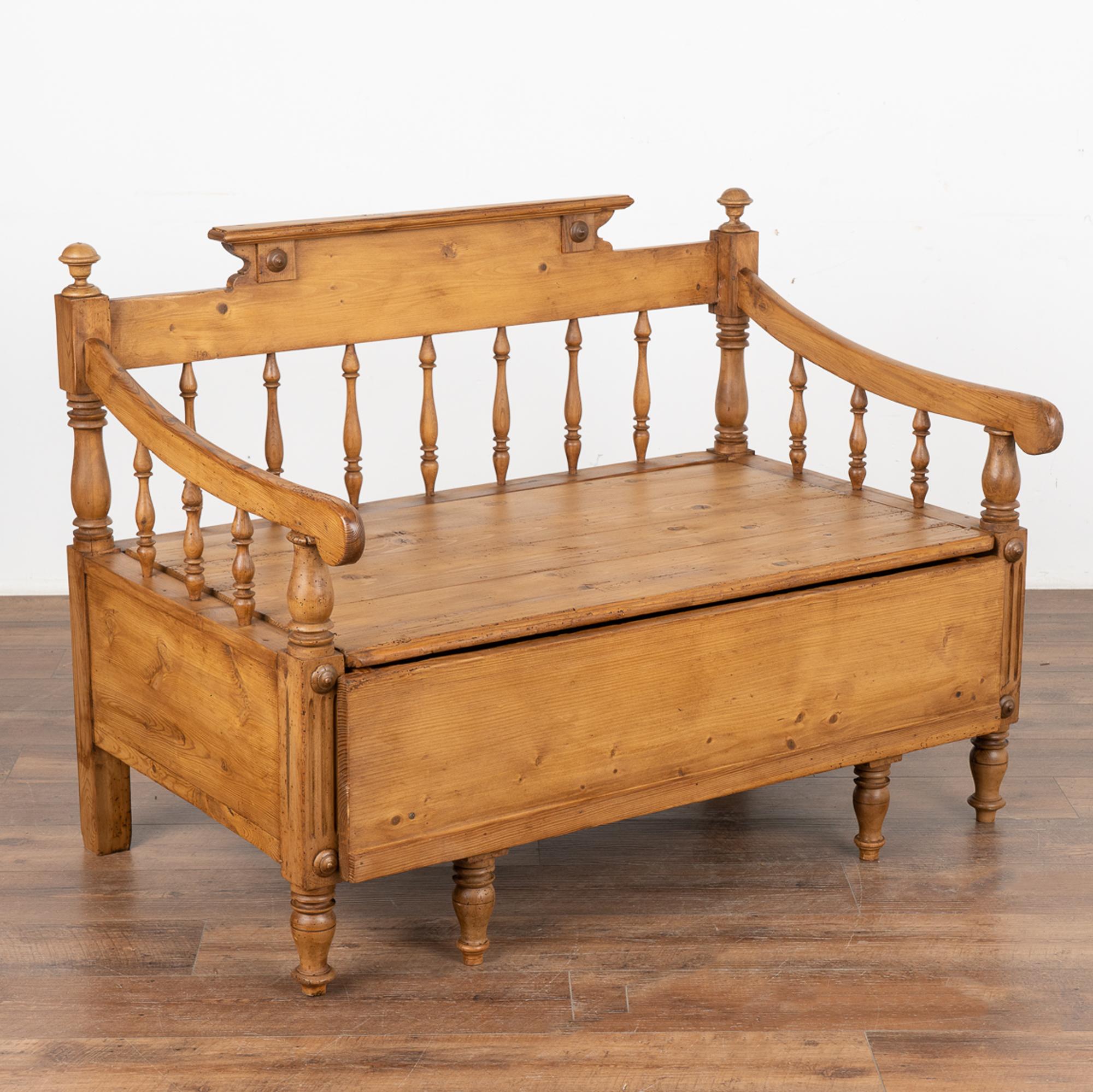 This delightful bench is a special find due to the unique small size. It was originally designed as a spare bed for a child; note how the seat lifts off to reveal storage space inside. When extended, the interior could house a small mattress similar
