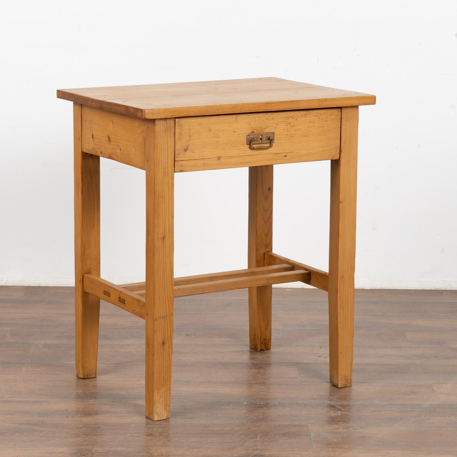 This delightful country pine table with single drawer will make a casual side table or nightstand. 
This table has been restored, the drawer function with brass pull and it is ready to be used and enjoyed.
Any scratches, cracks, dings, or age