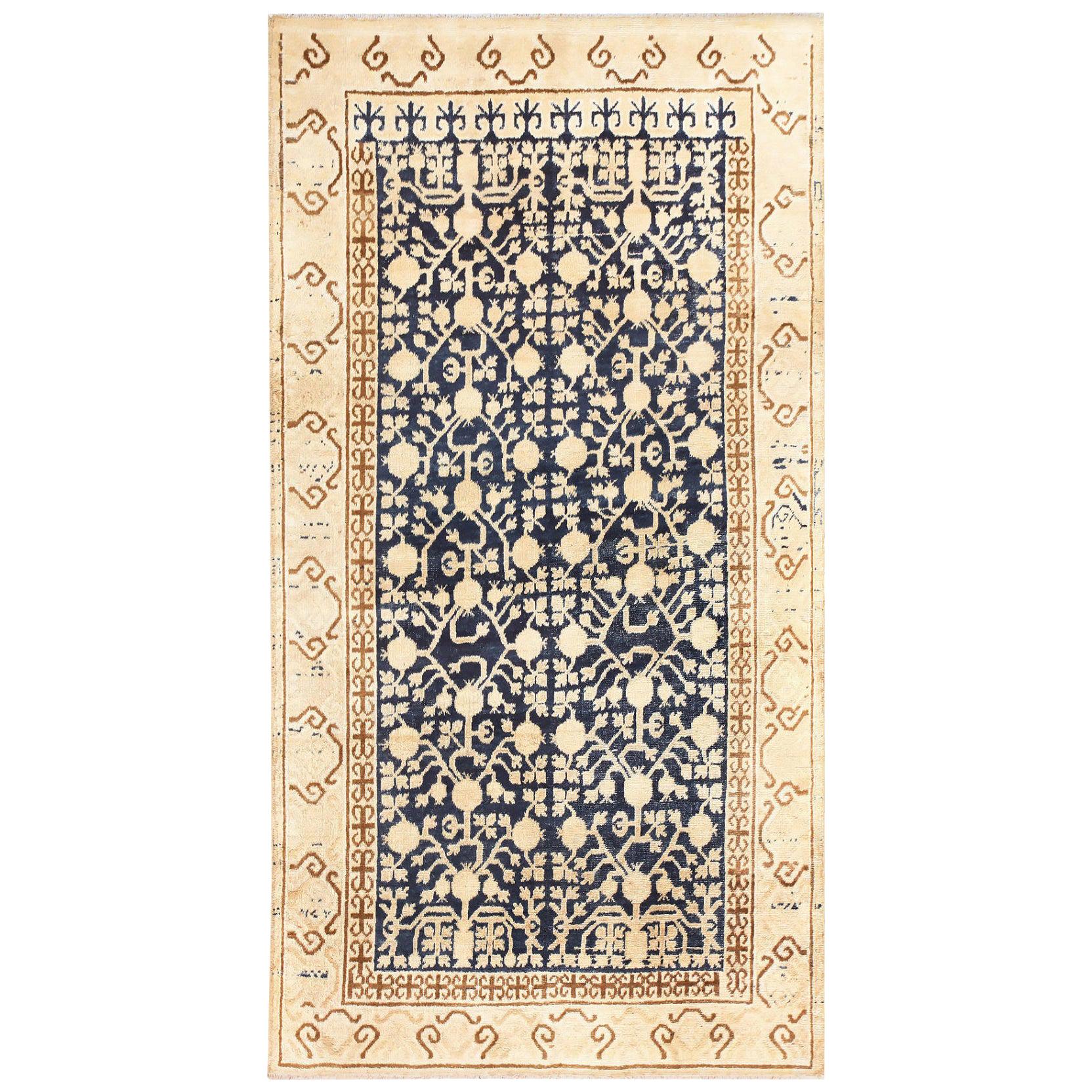 Small Pomegranate Design Antique Khotan Rug. Size: 4 ft 6 in x 8 ft 3 in For Sale