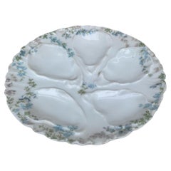 Piccolo piatto da ostrica in porcellana blu a fiori Limoges, circa 1900
