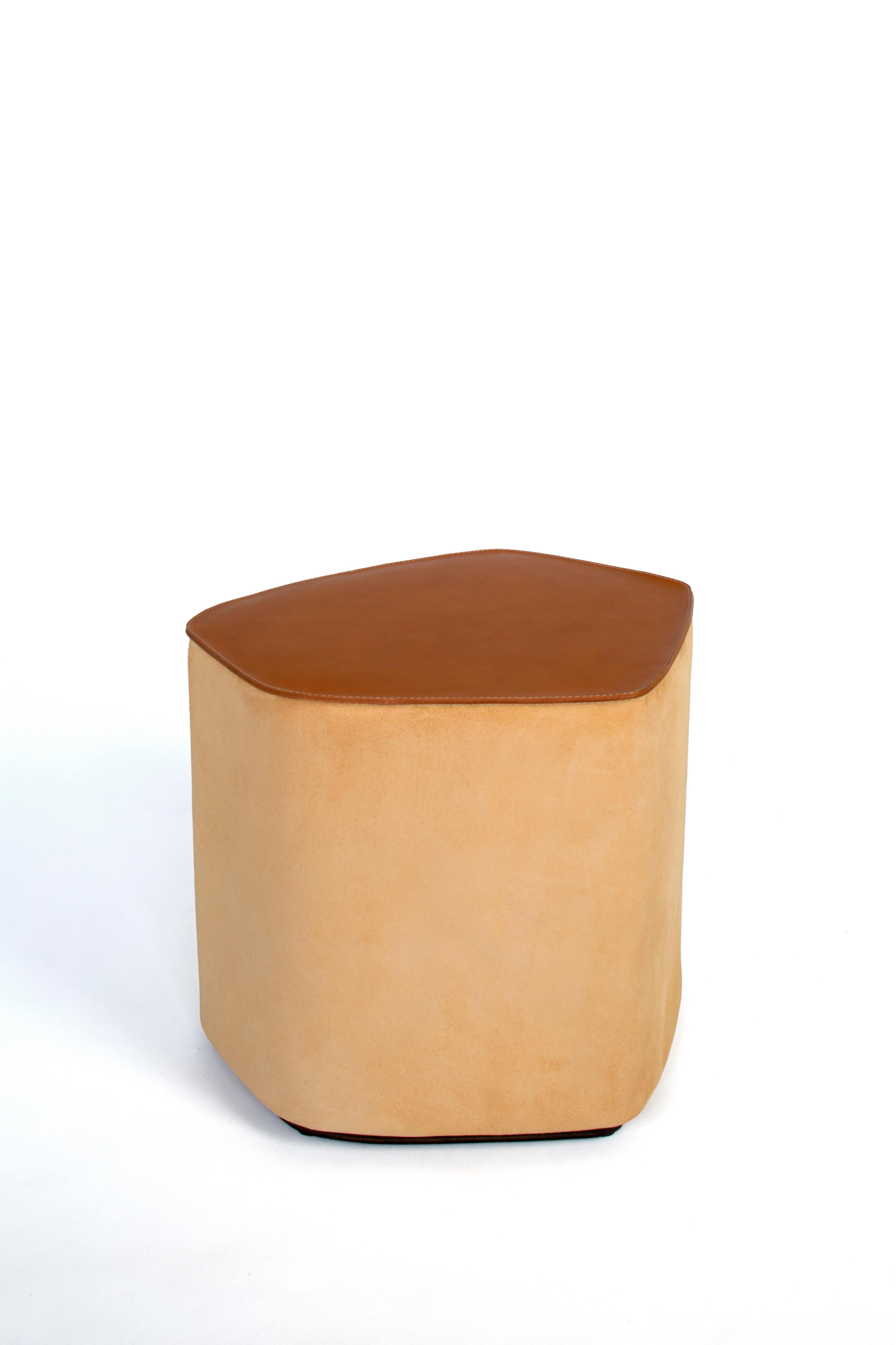 Small pouf! leather stool by Nestor Perkal
Dimensions: W 45 x D 39 x H 40 cm
Materials: Leather, poplar plywood, suede.
Available in other colors and in 3 sizes.

The POUF! collection is made up of three seats made of leather and suede. They