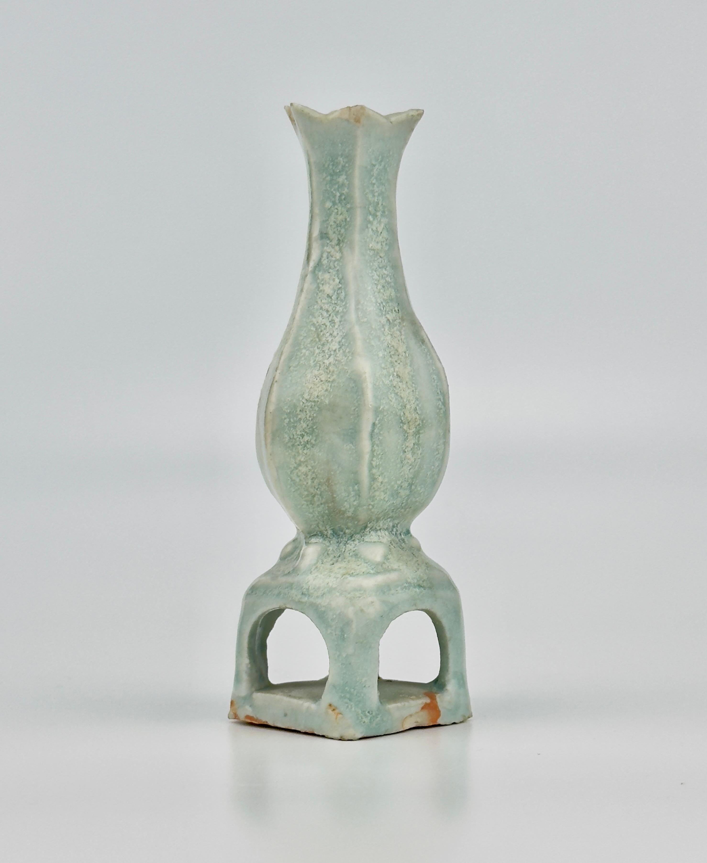 This exquisite piece is a Qingbai ware from the Song to Yuan dynasty, and it appears to be an excavated artifact given its earthy encrustations, suggesting it has rested in the ground for a lengthy period. Despite this, the piece retains its