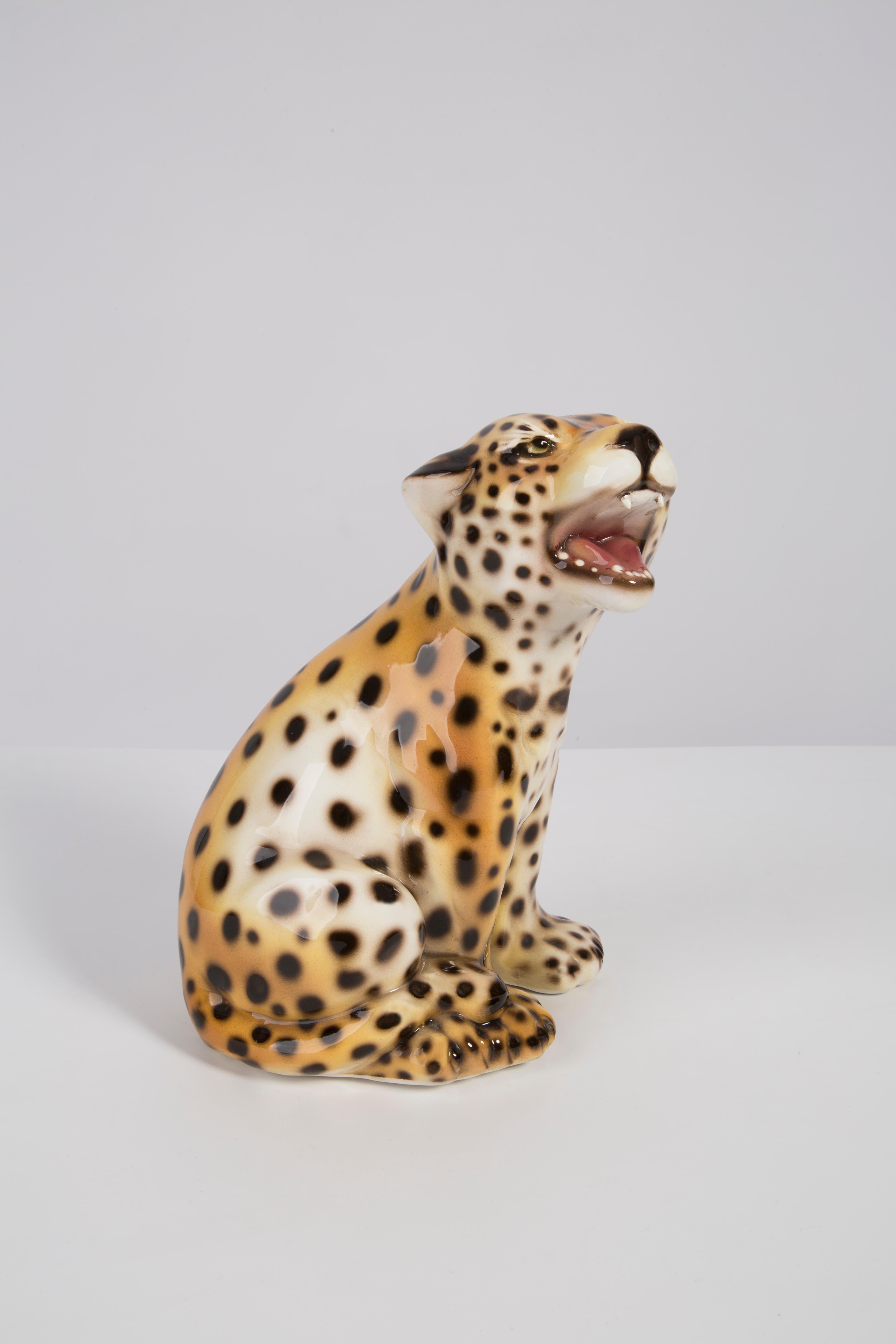 Painted ceramic, perfect condition. Beautiful and unique decorative small sculpture. Leopard was produced in 1960s in Italy.