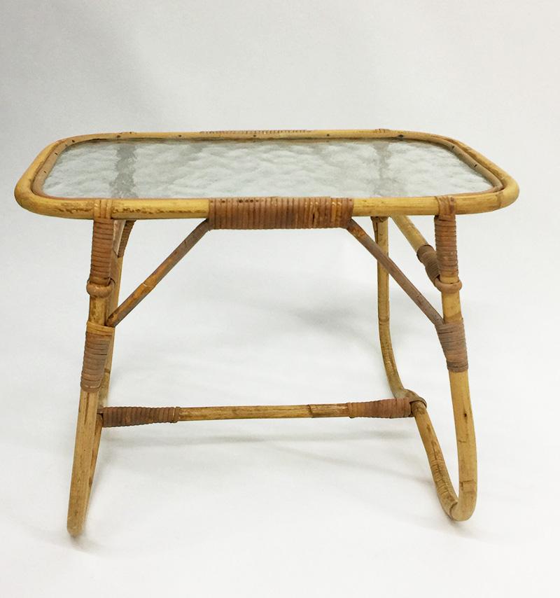 Rattan Side Coffee Table by Dirk Van Sliedrecht for Rohe Noordwolde, 1950s

Small side coffee table by Dirk Van Sliedrecht for Rohe Noordwolde, 1950s, The Netherlands.
A rattan and cane small side table with textured glass top.
Measurement is 39 cm