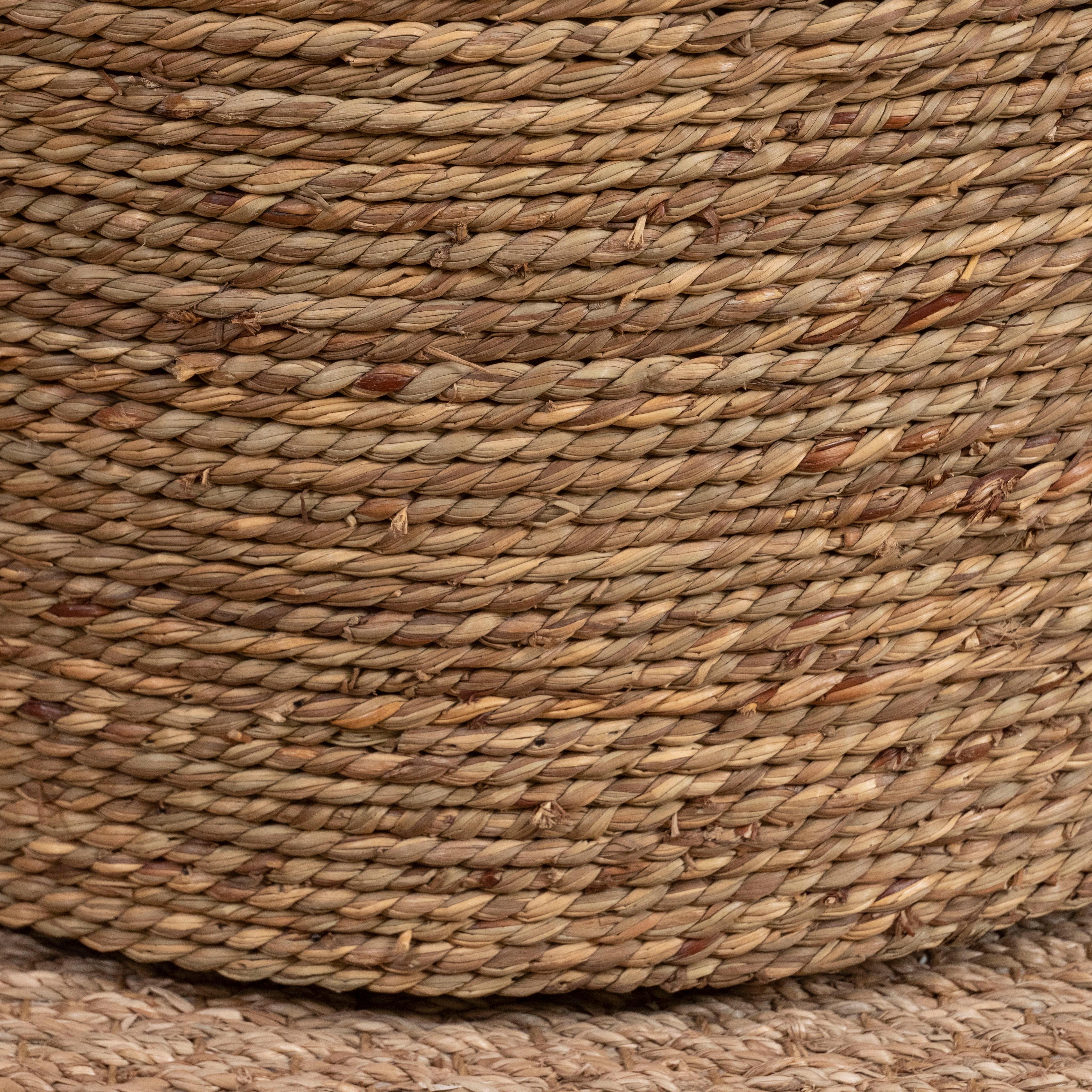 A perfect little accent piece, this round rattan table has a glass top. Great for a beach house or casual family room.
