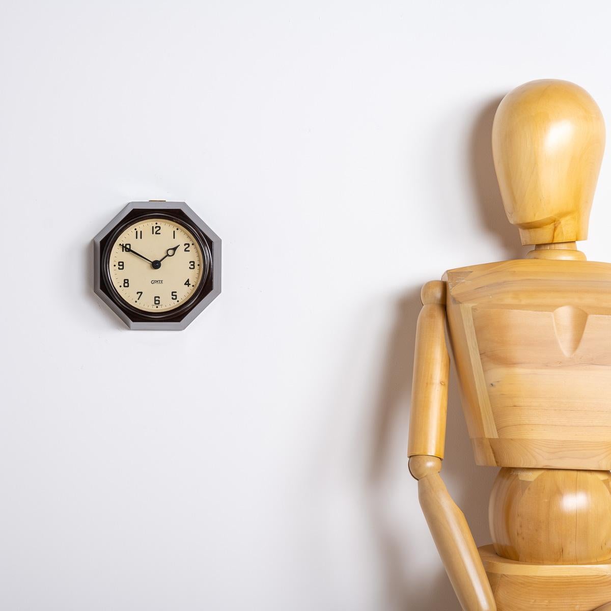 British Small Reclaimed Octagonal Bakelite Wall Clock by Gents of Leicester For Sale