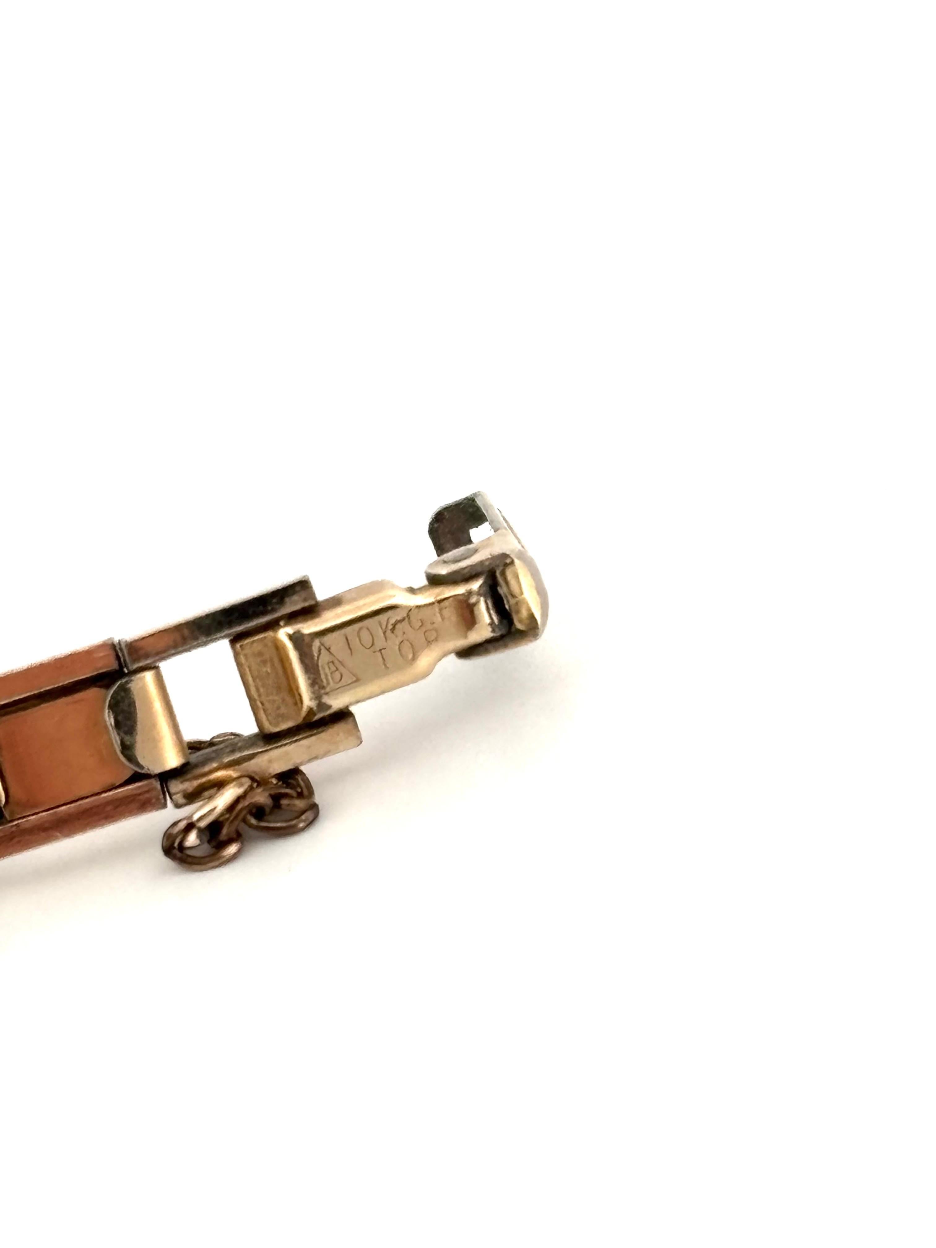Petite montre rectangulaire en or jaune 18K pour dames Bucherer Automatic Swiss Watch en vente 1