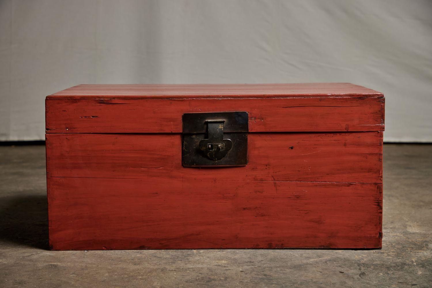 Small Red Cedar chest with metallic handle.
