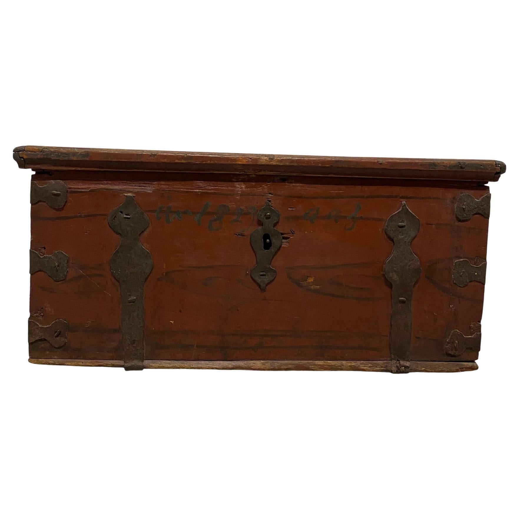 Small Red Painted 19th Century Trunk with Wrought Iron Straps For Sale