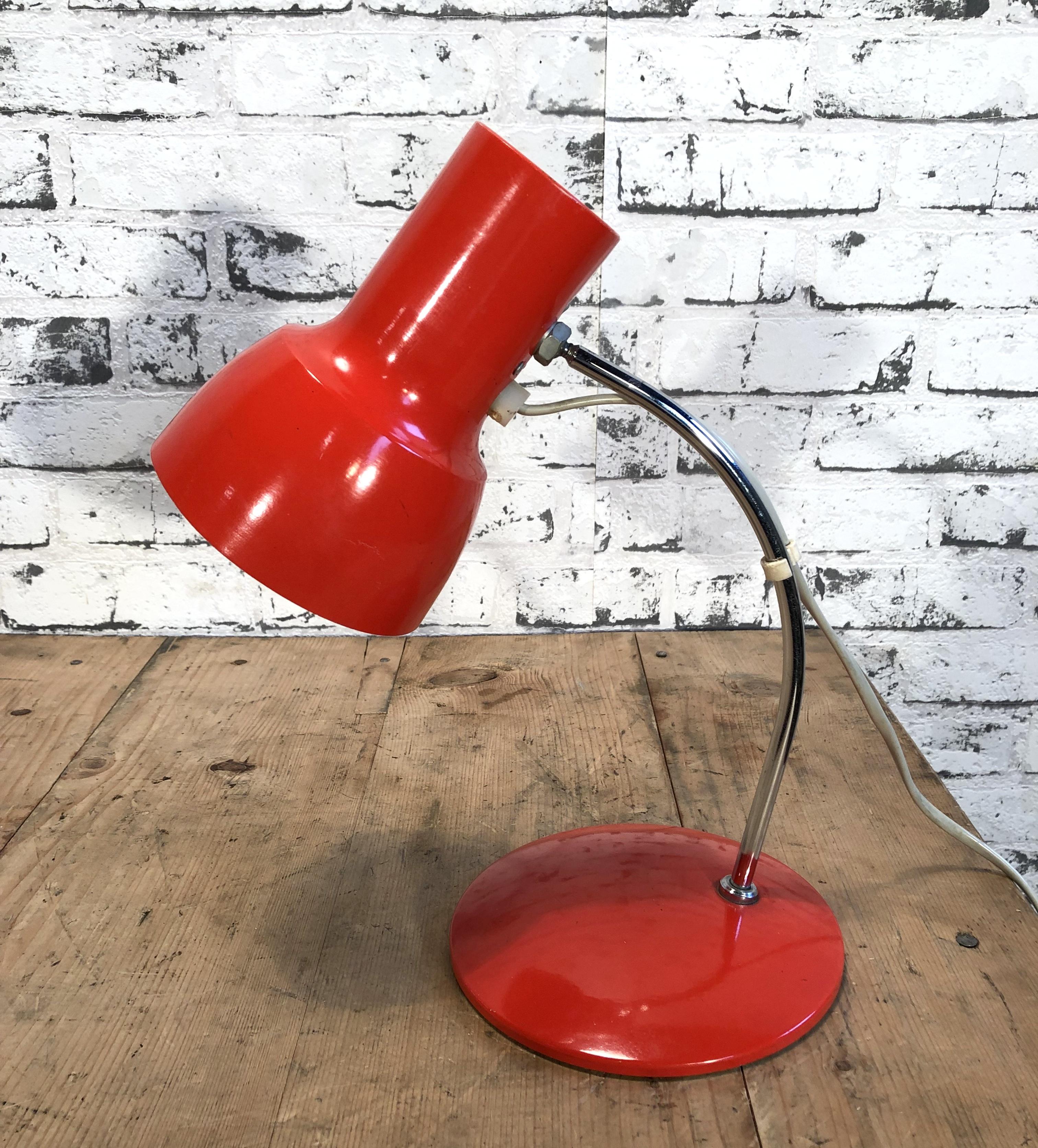 This small red table lamp was designed by Josef Hurka and produced by Napako in former Czechoslovakia during the 1960s. The lamp has a steel body and aluminum lampshade. Fully functional. Good vintage condition. Socket for E 14 ligt bulbs. Measures: